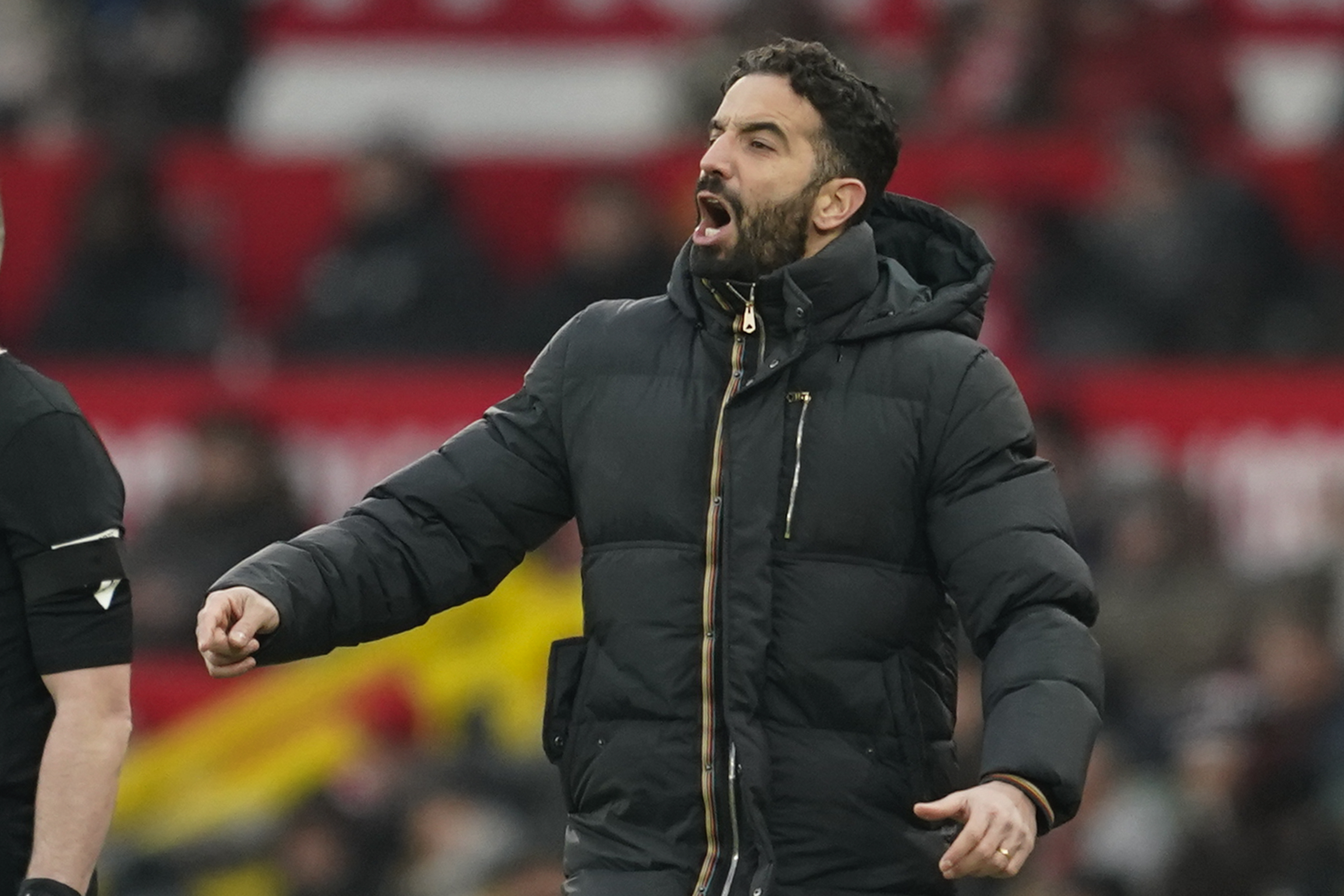 Manchester United's head coach Ruben Amorim follows the game during the English Premier League soccer match between Manchester United and Brighton and Hove Albion, at the Old Trafford stadium in Manchester, England, Sunday, Jan. 19, 2025.