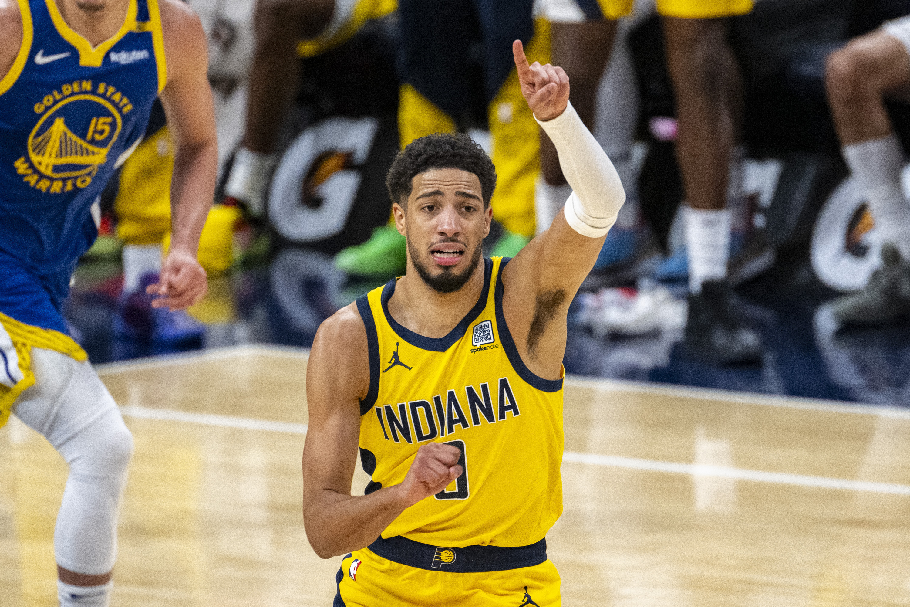 Indiana Pacers guard Tyrese Haliburton (0) gestures toward teammates up court during the second half of an NBA basketball game against the Golden State Warriors in Indianapolis, Friday, Jan. 10, 2025.