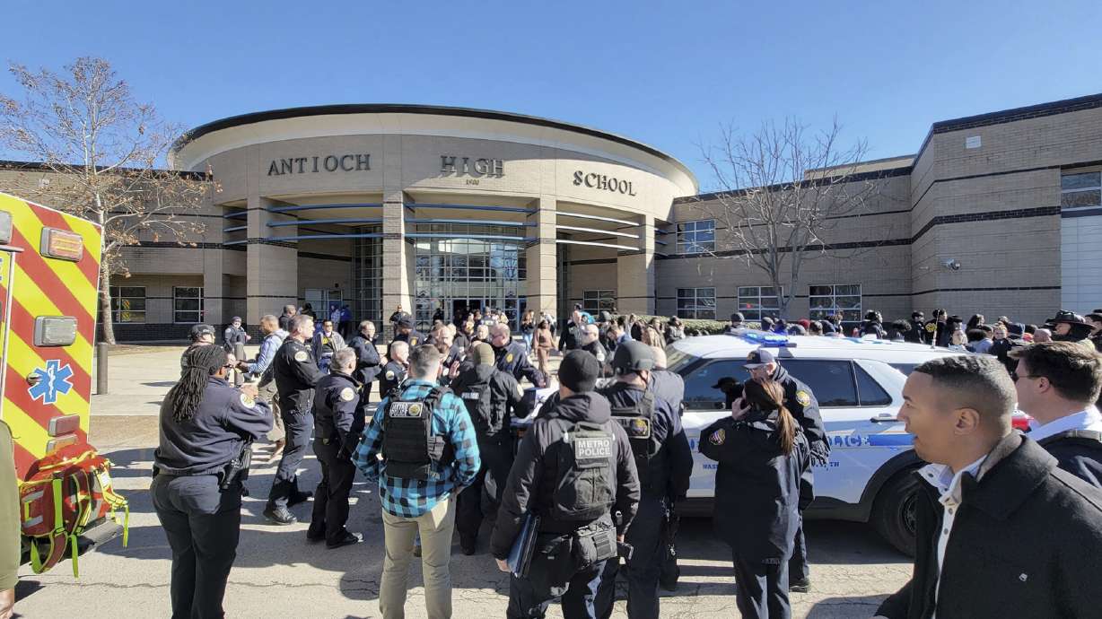 Emergency personnel gather outside Antioch High School after a shooting incident on Wednesday in Nashville, Tenn.