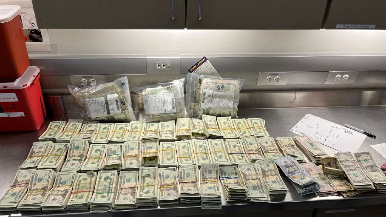 Salt Lake police seized more than $56,000 in cash, guns, gambling machines and drugs from two businesses Tuesday as part of an investigation into illegal gambling.
