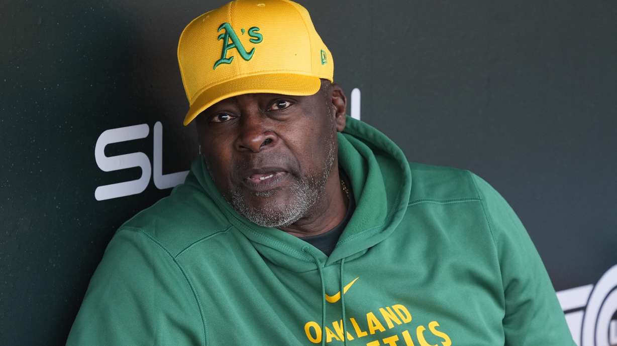 FILE- Athletics special assistant to the general manager Dave Stewart talks in the dugout prior to a spring training baseball game against the Chicago Cubs Thursday, March 14, 2024, in Mesa, Ariz.