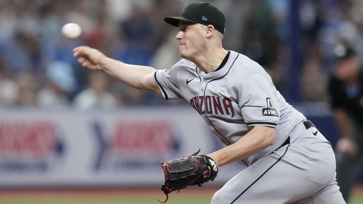 FILE - Arizona Diamondbacks relief pitcher Paul Sewald throws during the eighth inning of a baseball game against the Tampa Bay Rays, Saturday, Aug. 17, 2024, in St. Petersburg, Fla.