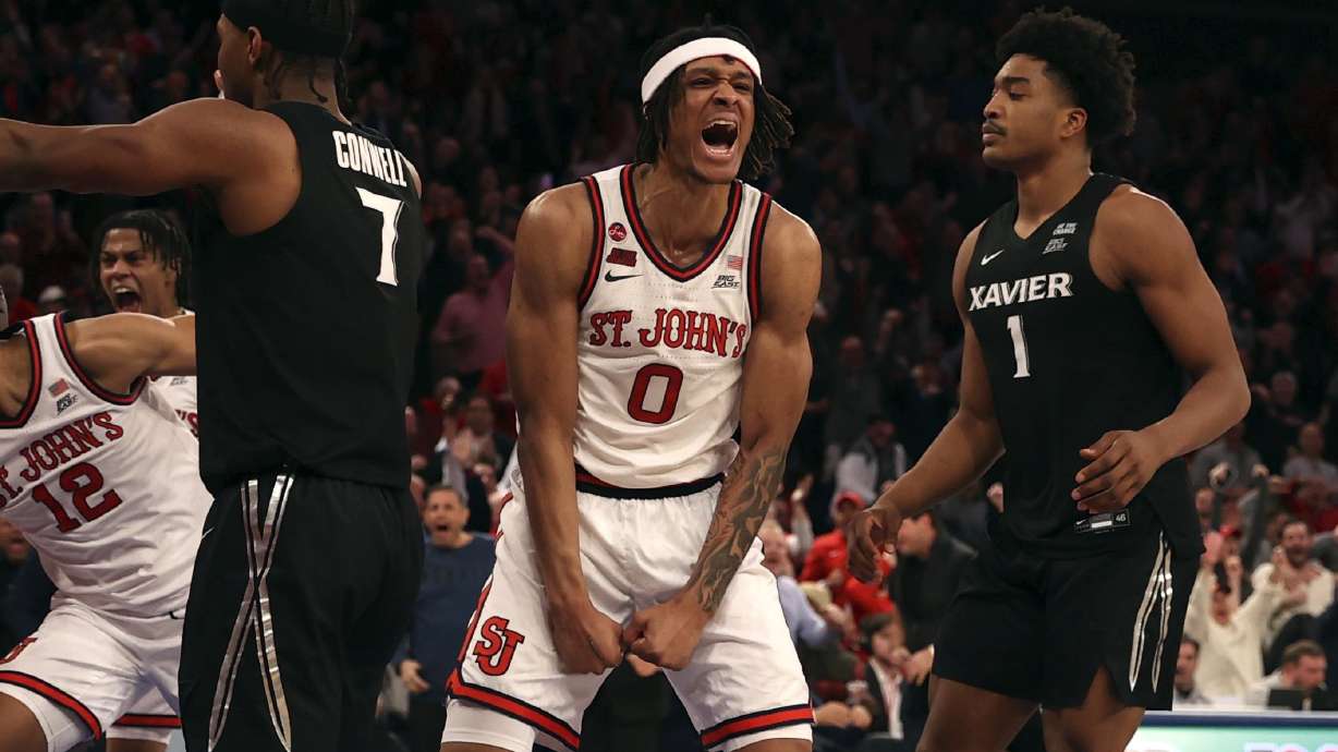 St. John's guard Aaron Scott (0) yells during the second half of an NCAA college basketball game against Xavier, Wednesday, Jan. 22, 2025, in New York.