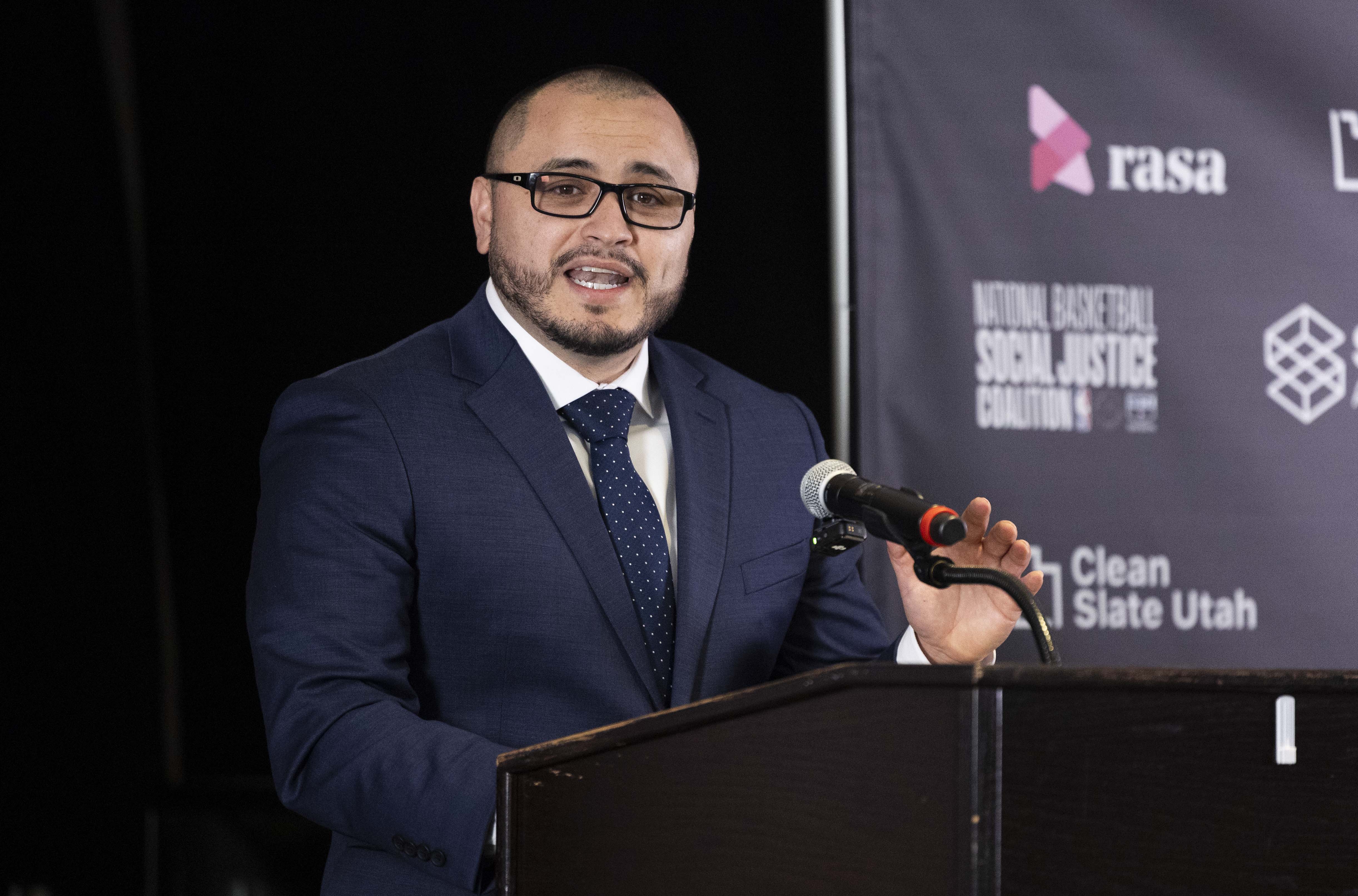 Hisrael “Izzy” Carranza speaks to media about how expungement positively changed his life during the 2025 Utah Expungement Summit at the Delta Center in Salt Lake City on Wednesday.