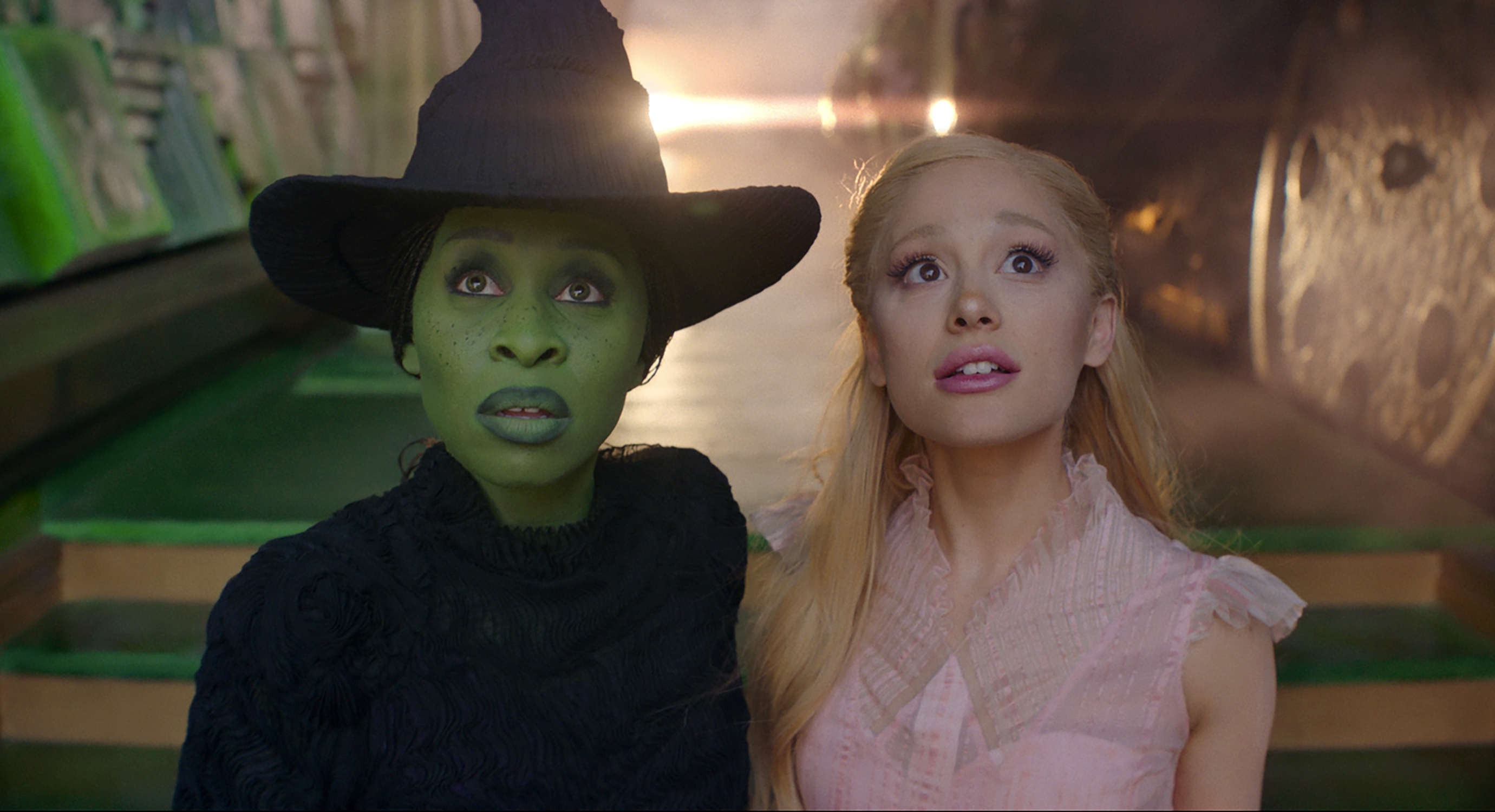 This image released by Universal Pictures shows Cynthia Erivo, left, and Ariana Grande in a scene from the film "Wicked."