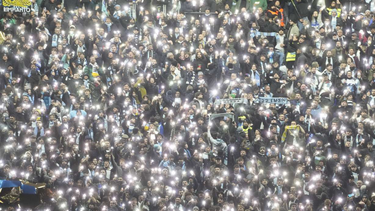 Lazio's fans support their team before the Italian Serie A soccer match between Lazio and Como at Rome's Olympic stadium, Friday, Jan. 10, 2025.