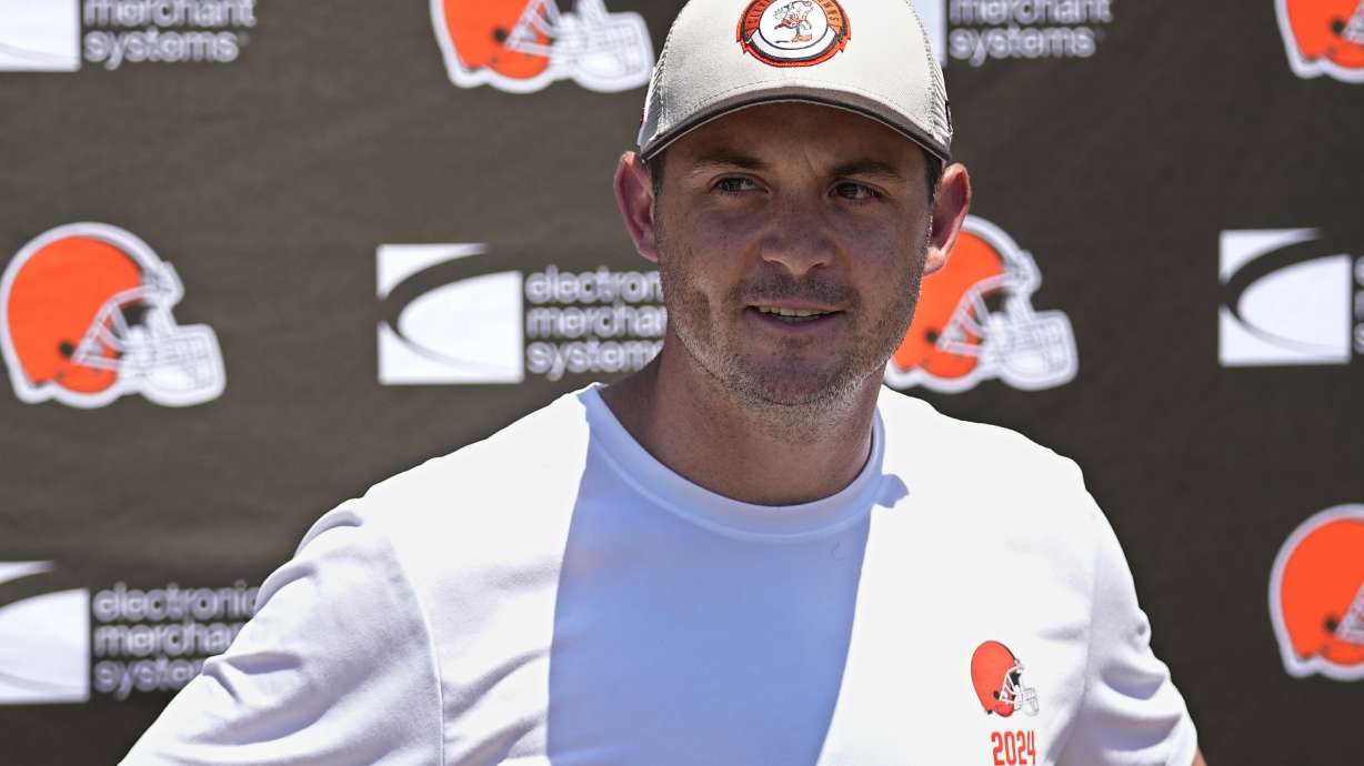 FILE - Tommy Rees, Cleveland Browns tight ends coach, answers a question at a news conference during an NFL football practice in Berea, Ohio, Thursday, June 13, 2024.