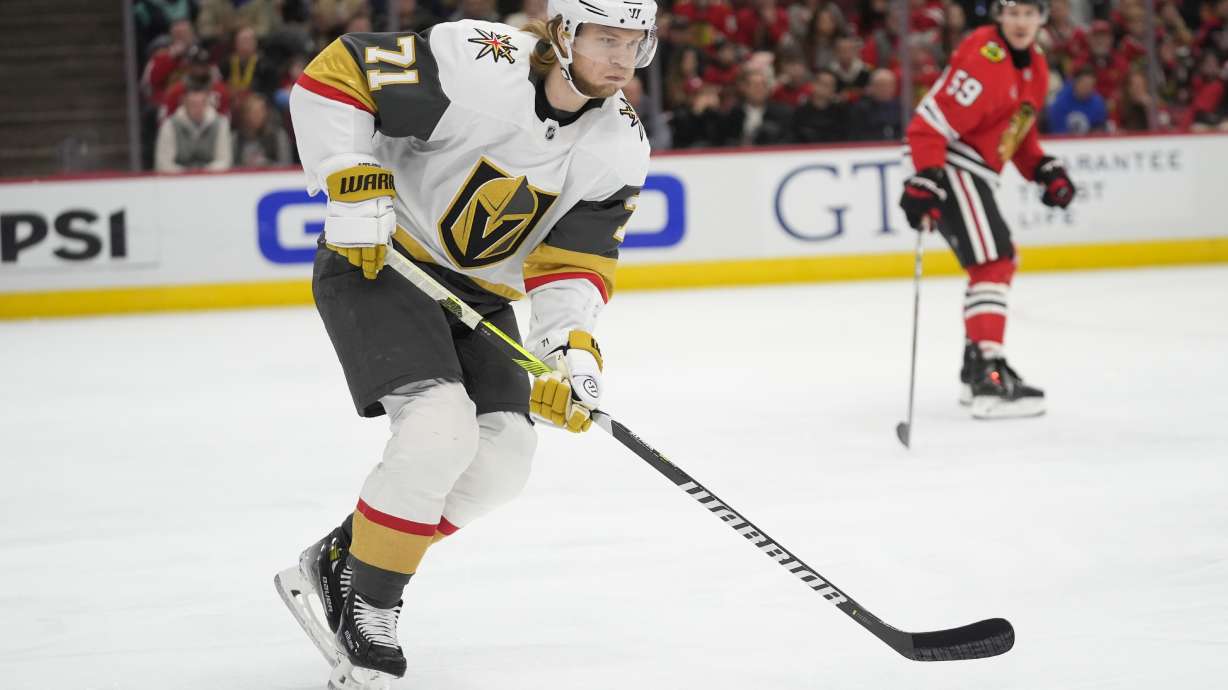 Vegas Golden Knights center William Karlsson (71) handles the puck during the first period of an NHL hockey game against the Chicago Blackhawks, Saturday, Jan. 18, 2025, in Chicago.