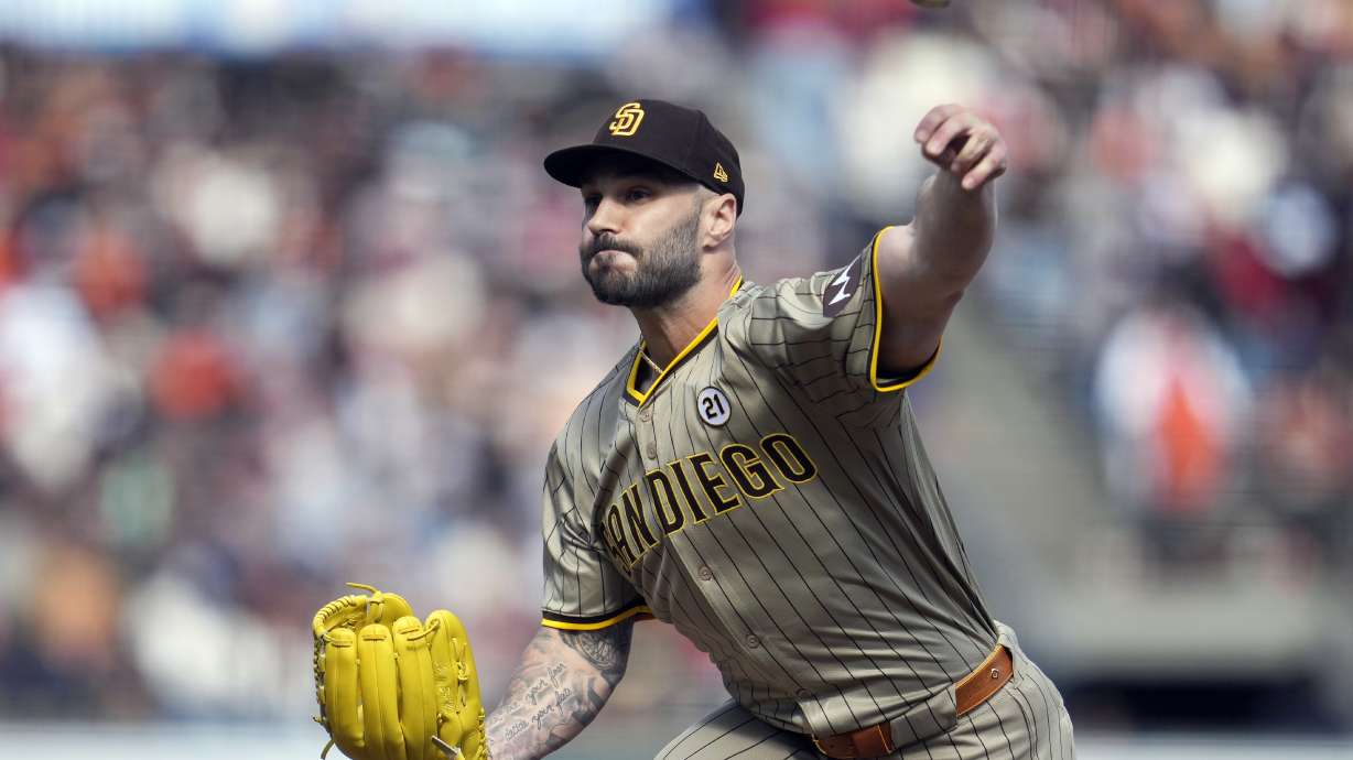 FILE 0 San Diego Padres pitcher Tanner Scott throws during a baseball game against the San Francisco Giants in San Francisco, Sunday, Sept. 15, 2024.
