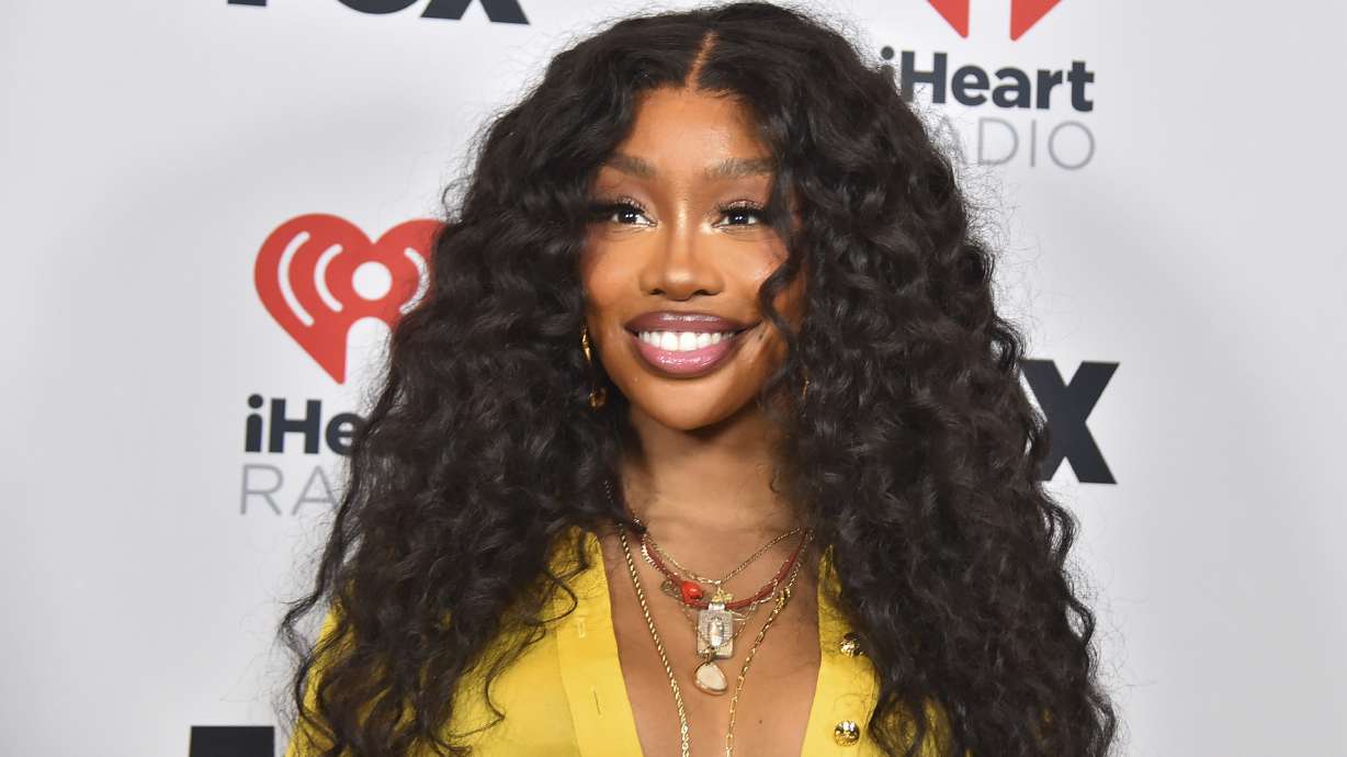 FILE - SZA poses in the press room at the iHeartRadio Music Awards on Monday, April 1, 2024, in Los Angeles.