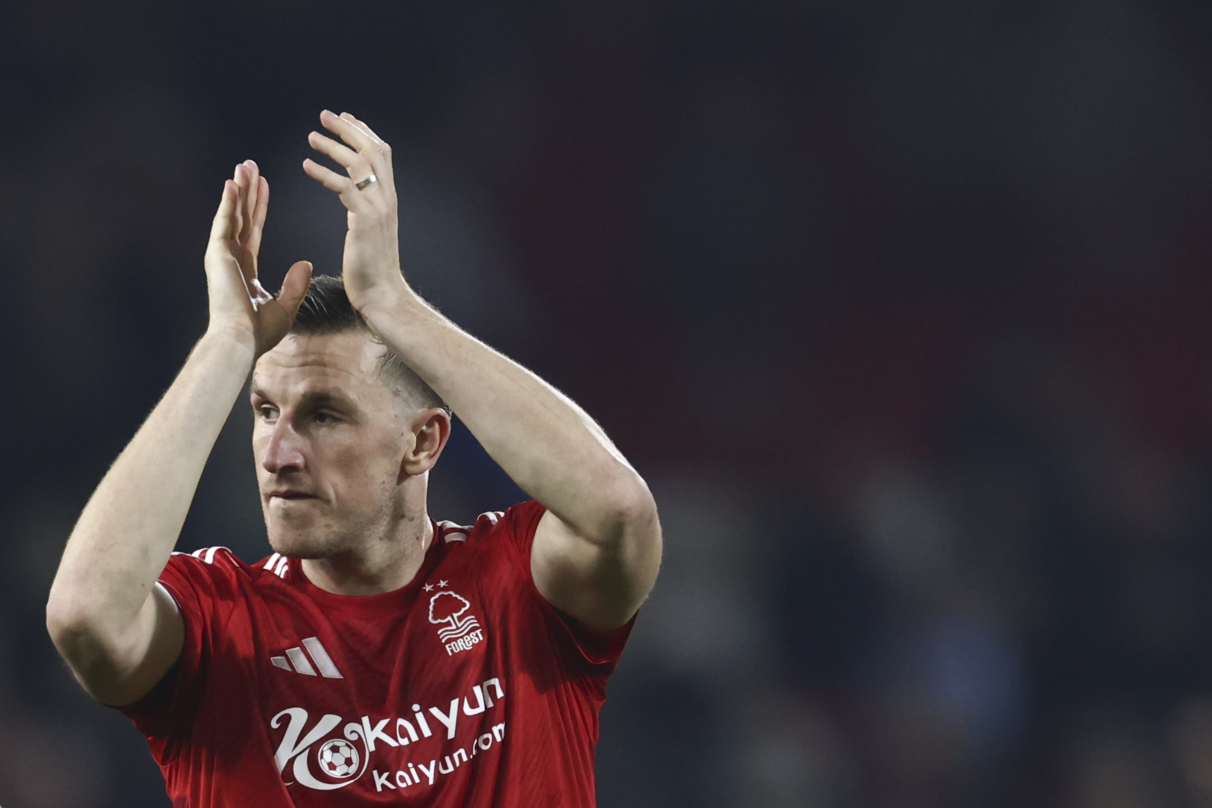 Nottingham Forest's Chris Wood greets fans at the end of the English Premier League soccer match between Nottingham Forest and Liverpool at the City Ground stadium in Nottingham, England, Tuesday, Jan. 14, 2025.