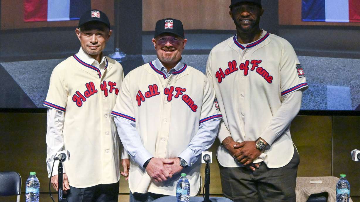Newly elected Baseball Hall of Fame inductee Ichiro Suzuki, left, Billy Wagner, center, and CC Sabathia pose for photo during a news conference Thursday, Jan. 23, 2025, in Cooperstown, N.Y.