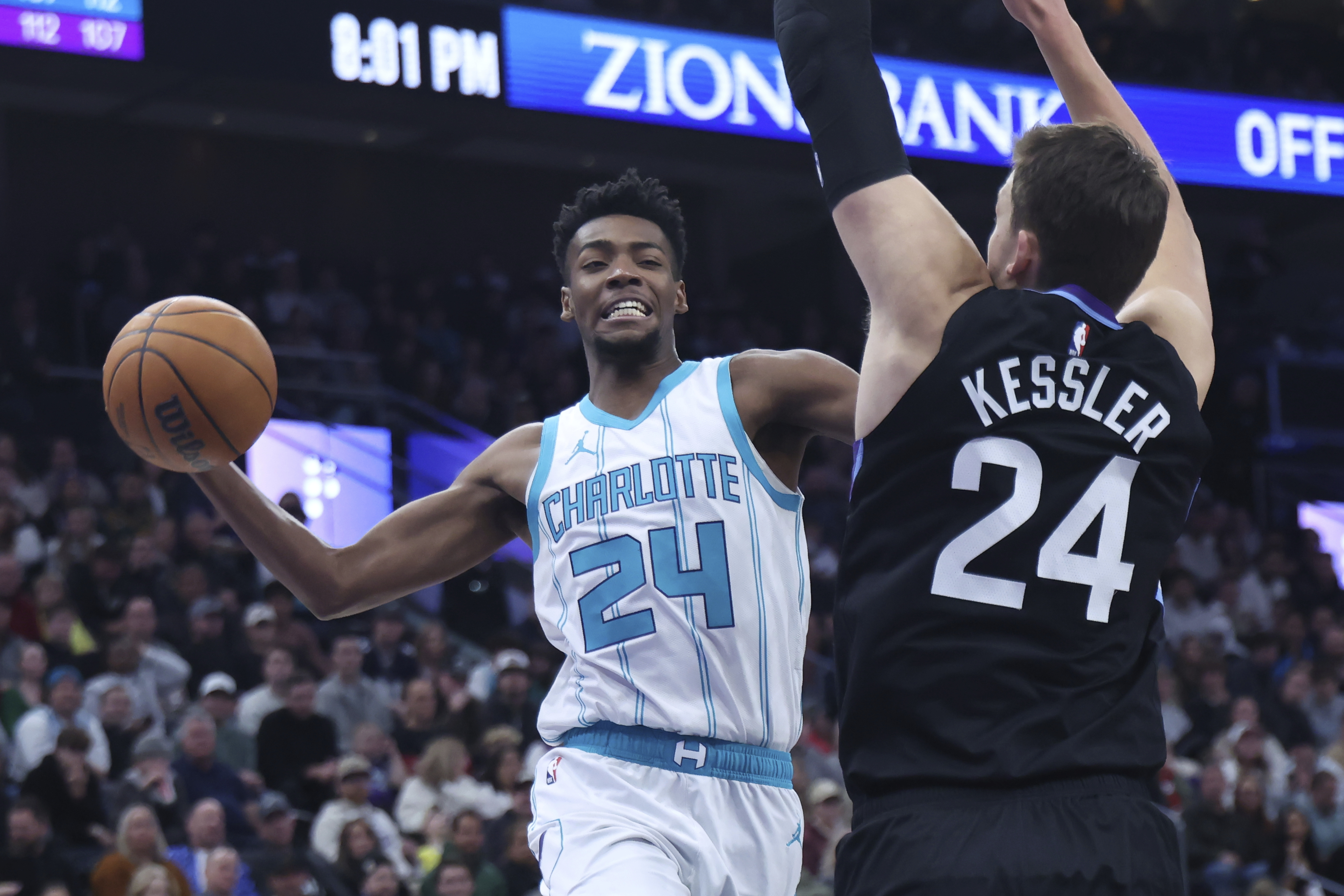 Charlotte Hornets forward Brandon Miller (24) goes to the basket against Utah Jazz center Walker Kessler (24) during the second quarter of an NBA basketball game, Wednesday, Jan. 15, 2025, in Salt Lake City.