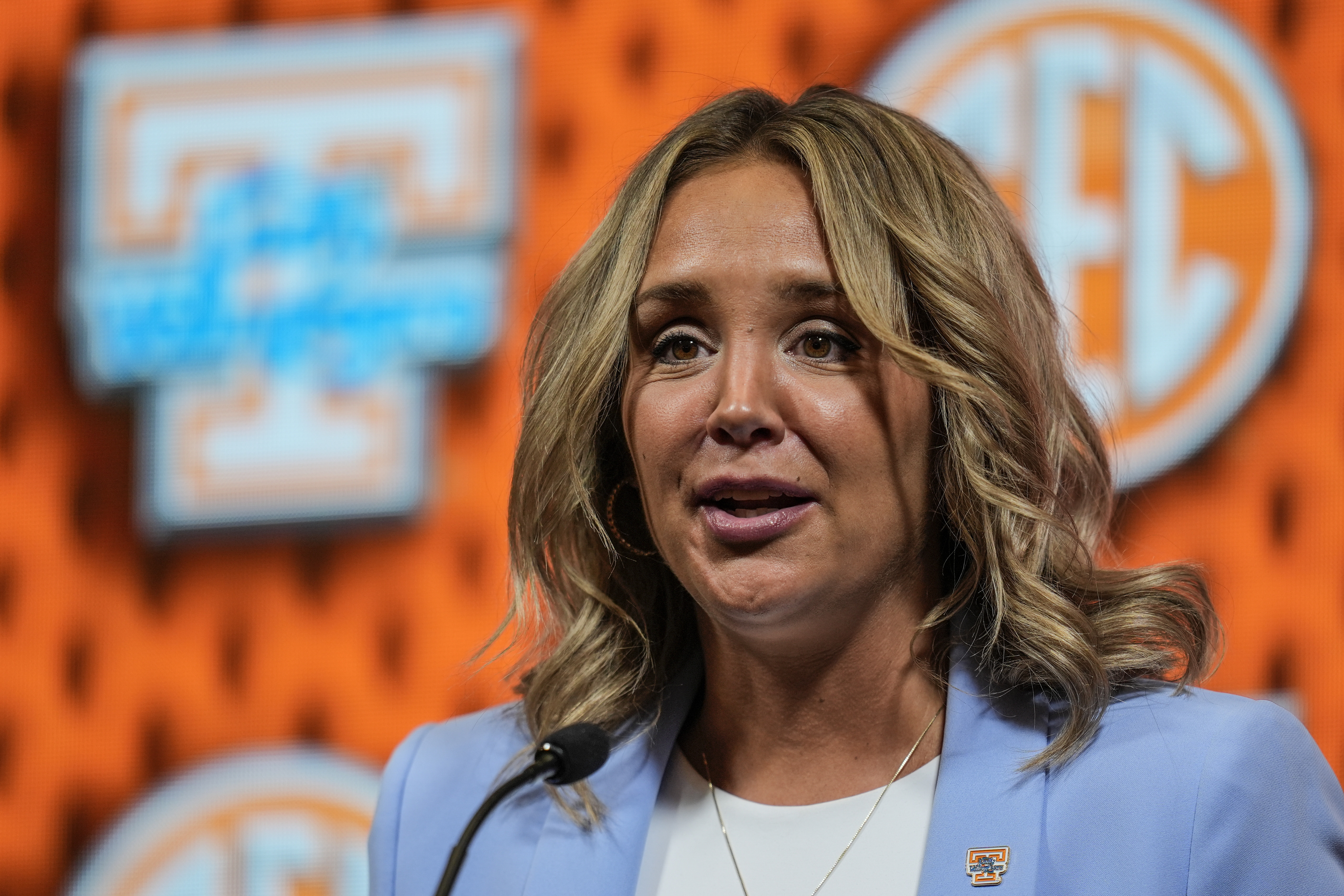 Tennessee coach Kim Caldwell misses loss at Texas after giving birth to son