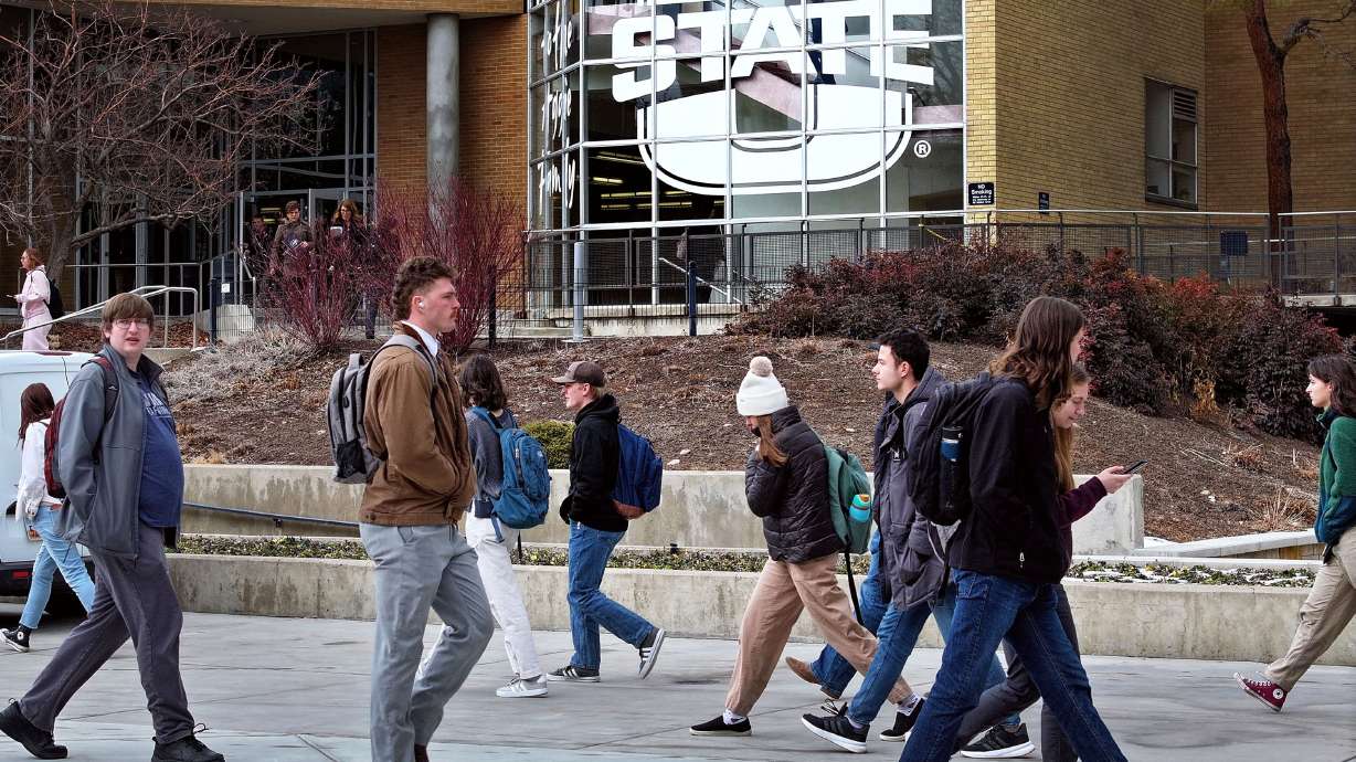 Students walk on the campus of Utah State University in Logan on Jan. 17. Both fundamental and philosophical questions about higher education in Utah were discussed Thursday at the Legislative Higher Education Appropriation Subcommittee meeting in Salt Lake City.