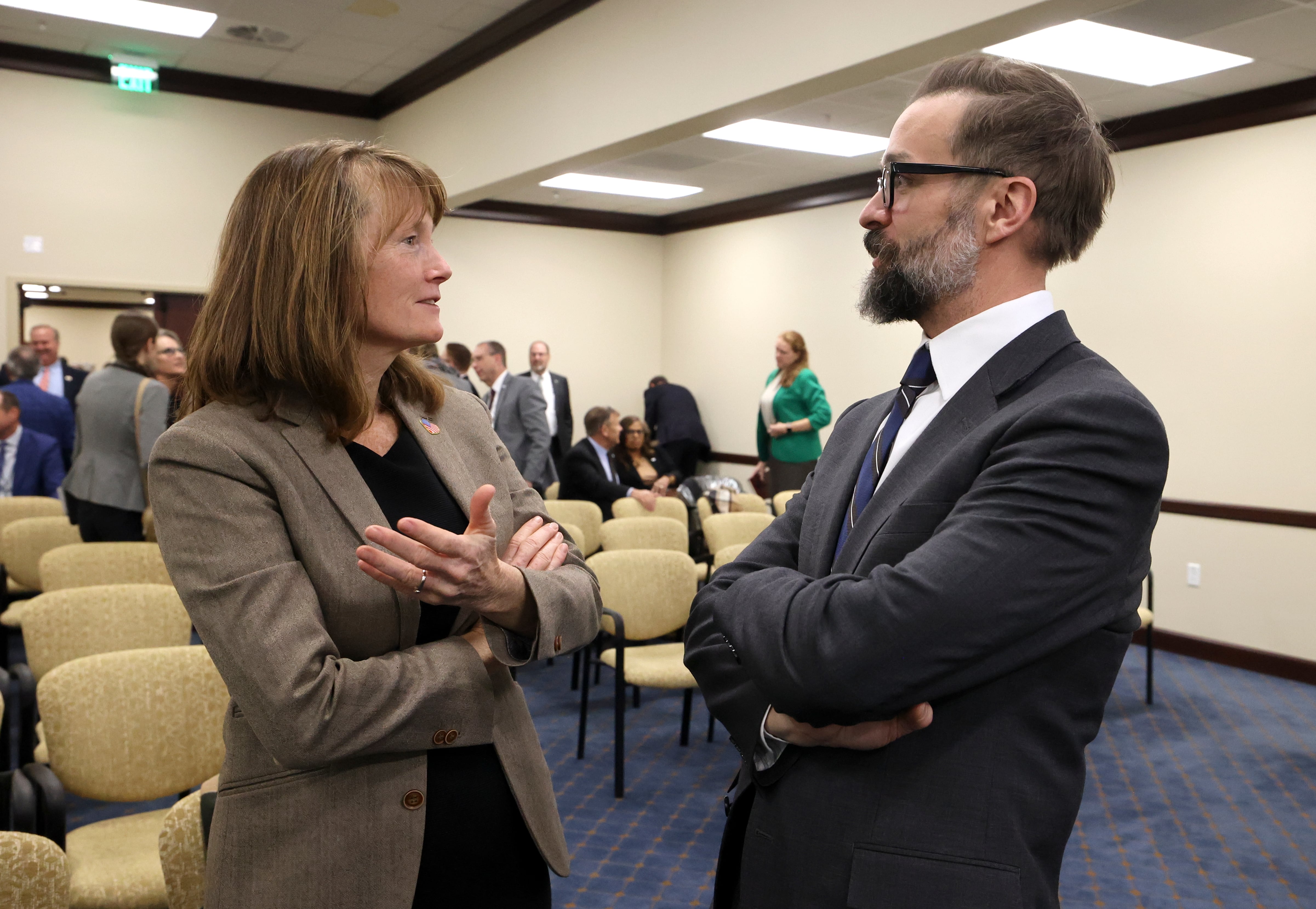 Sen. Kathleen A. Riebe, D-Salt Lake City, talks with Geoffrey Landward, Utah System of Higher Education commissioner, after a meeting with the Higher Education Appropriations Subcommittee about the higher education budget in the Senate Building in Salt Lake City on Thursday.