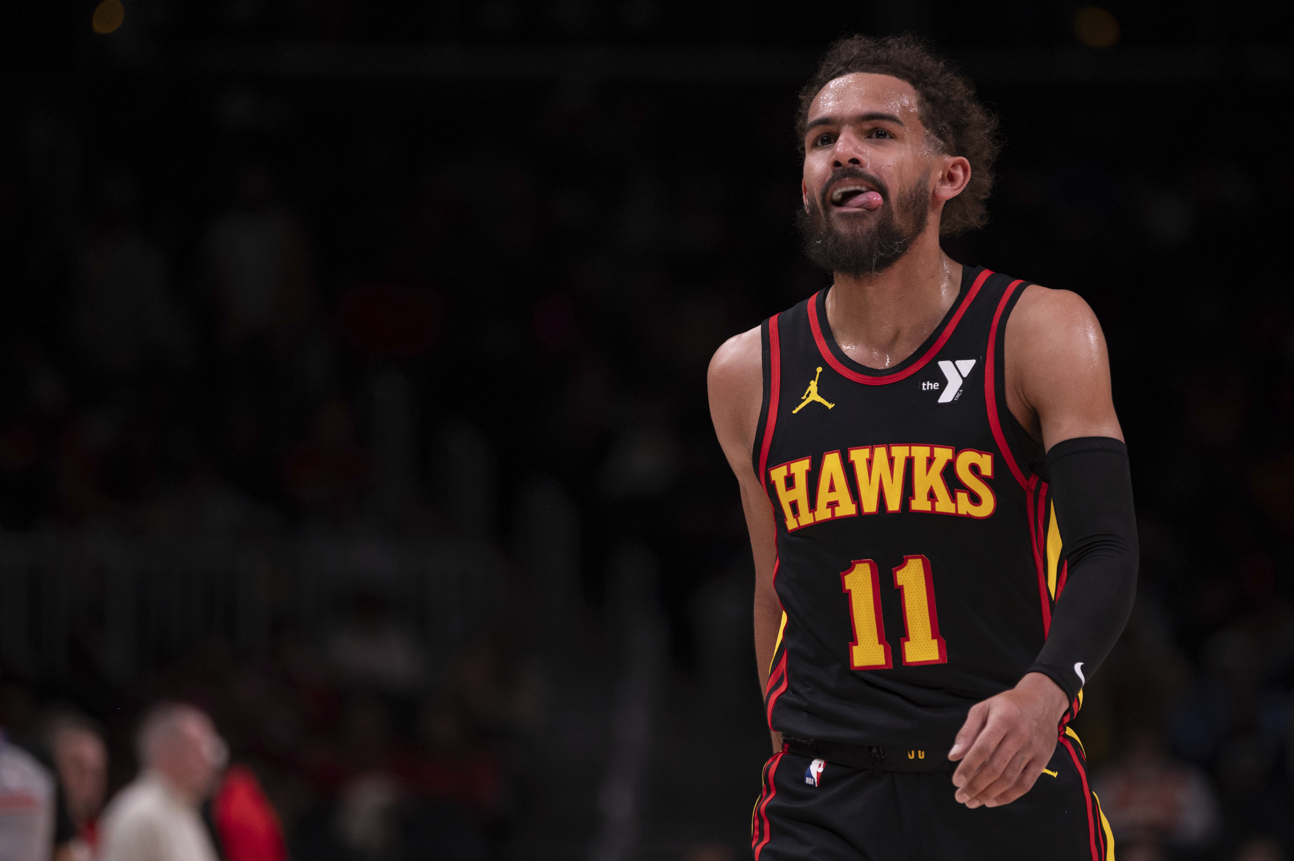 Atlanta Hawks guard Trae Young walks back to the bench during the first half of an NBA basketball game against the Toronto Raptors, Thursday, Jan. 23, 2025, in Atlanta.