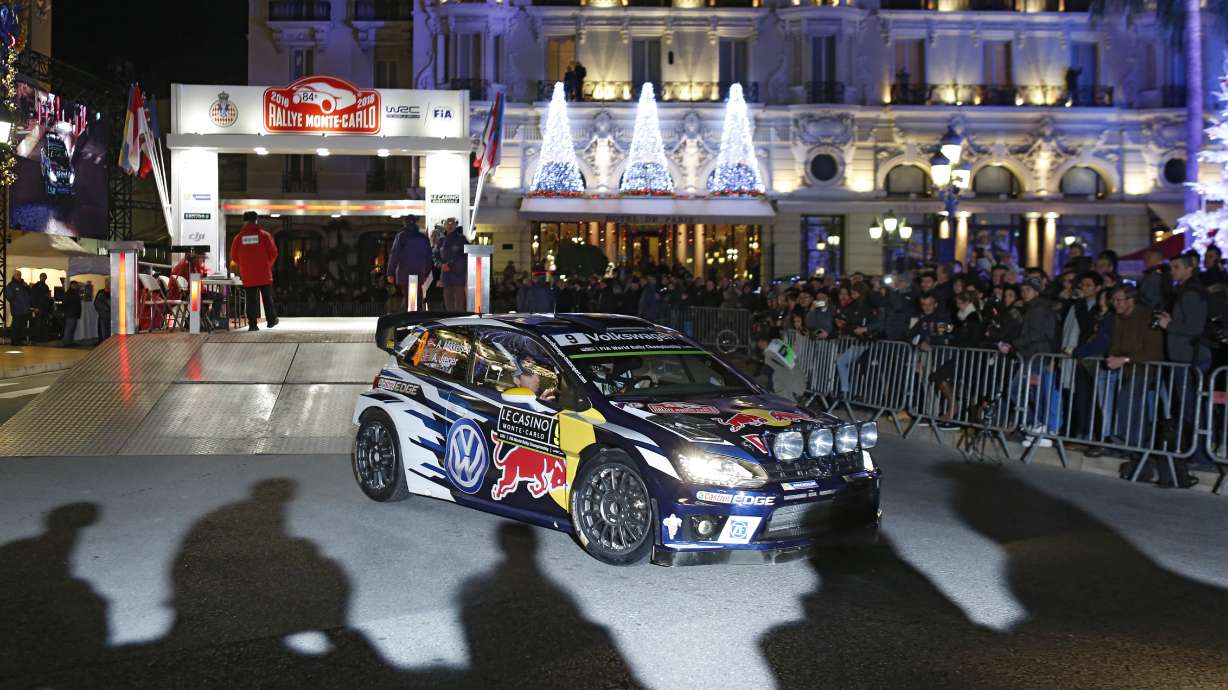 FILE - Andreas Mikkelsen of Norway, steering a Polo Volkswagen, starts the 84th Rally of Monte Carlo, from Monaco, Thursday, Jan. 21, 2016.