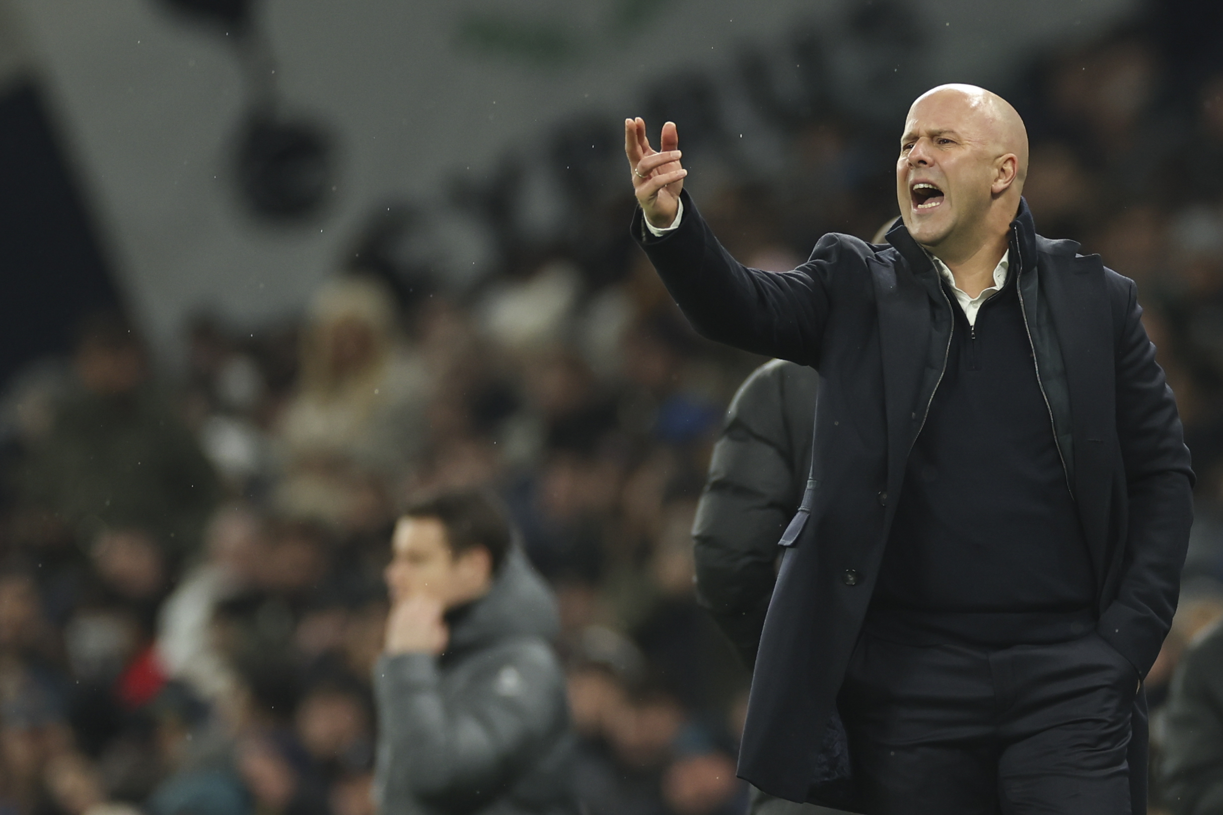 Liverpool's manager Arne Slot reacts during the English League Cup semi final first leg soccer match between Tottenham and Liverpool, at the Tottenham Hotspur Stadium in London, Wednesday, Jan. 8, 2025.