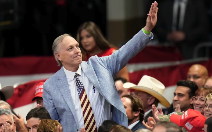 Arizona 5th Congressional District Republican Rep. Andy Biggs waves to the crowd as he is introduced by President Donald Trump at a campaign rally, Sunday, Oct. 13, 2024, in Prescott Valley, Ariz.