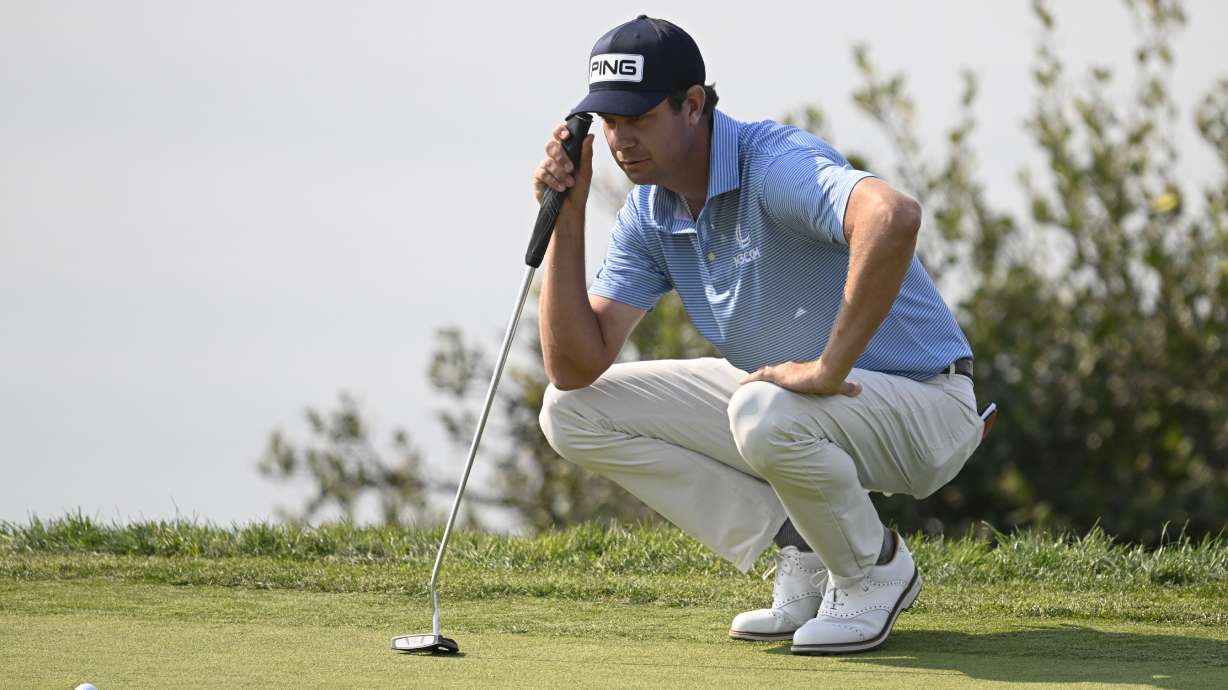 Harris English lines up a putt on the fourth hole on the South Course at Torrey Pines during the third round of the Farmers Insurance Open golf tournament Friday, Jan. 24, 2025, in San Diego.