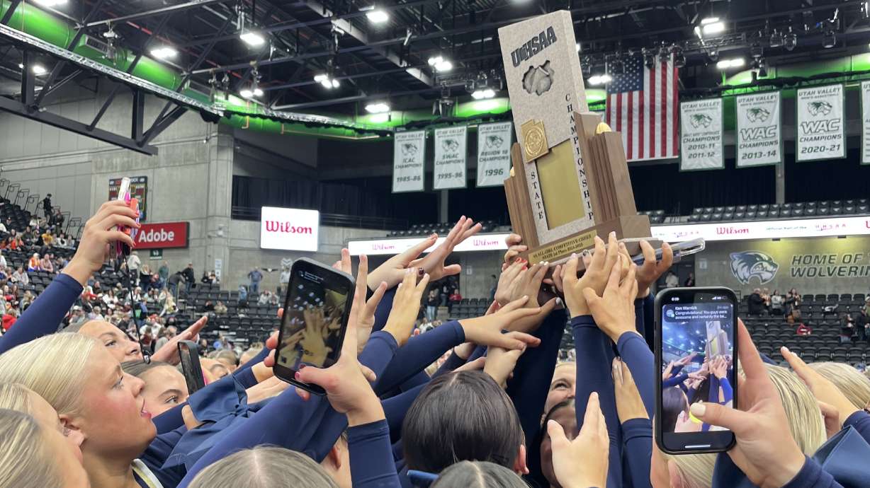 Snow Canyon all-girls celebrates winning the 4A state cheer title, Friday, Jan. 24, 2025 at the UCCU Center at Utah Valley University in Orem.