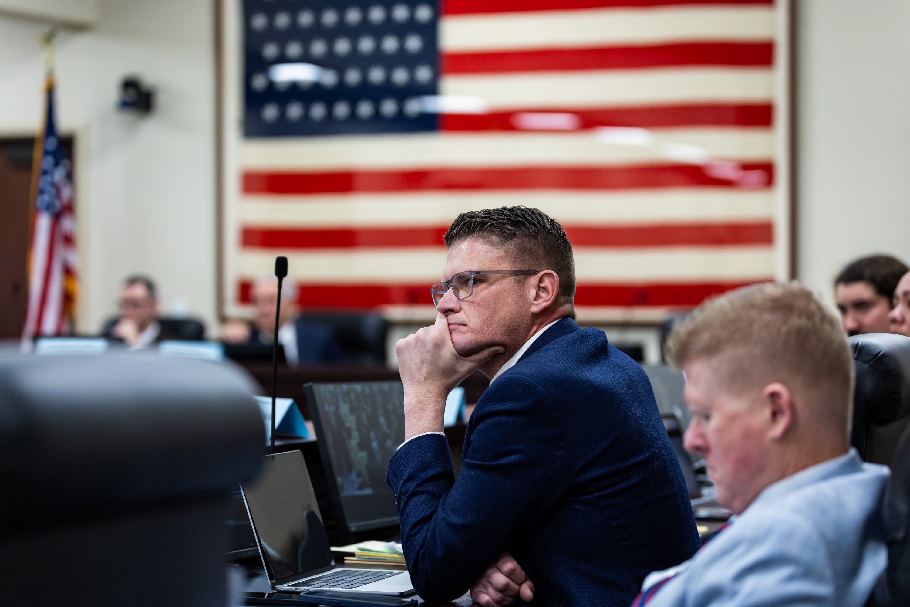 Rep. Jason Thompson, R-River Heights, listens as people make public comment after House Majority Whip Karianne Lisonbee, R-Syracuse, sponsored HB252 in a Senate committee room at the Capitol in Salt Lake City on Friday.