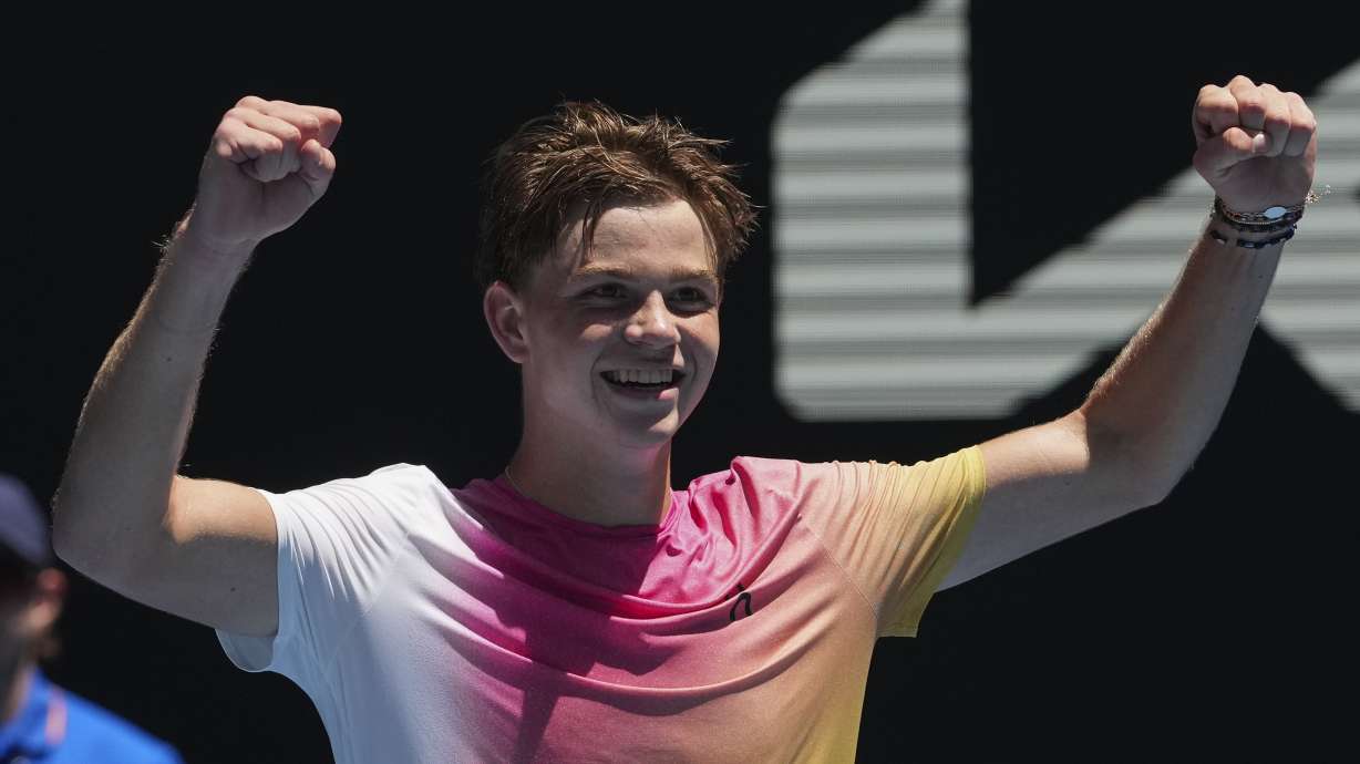 Henry Bernet of Switzerland celebrates after defeating Benjamin Willwerth of the U.S. in the boy's singles final at the Australian Open tennis championship in Melbourne, Australia, Saturday, Jan. 25, 2025.