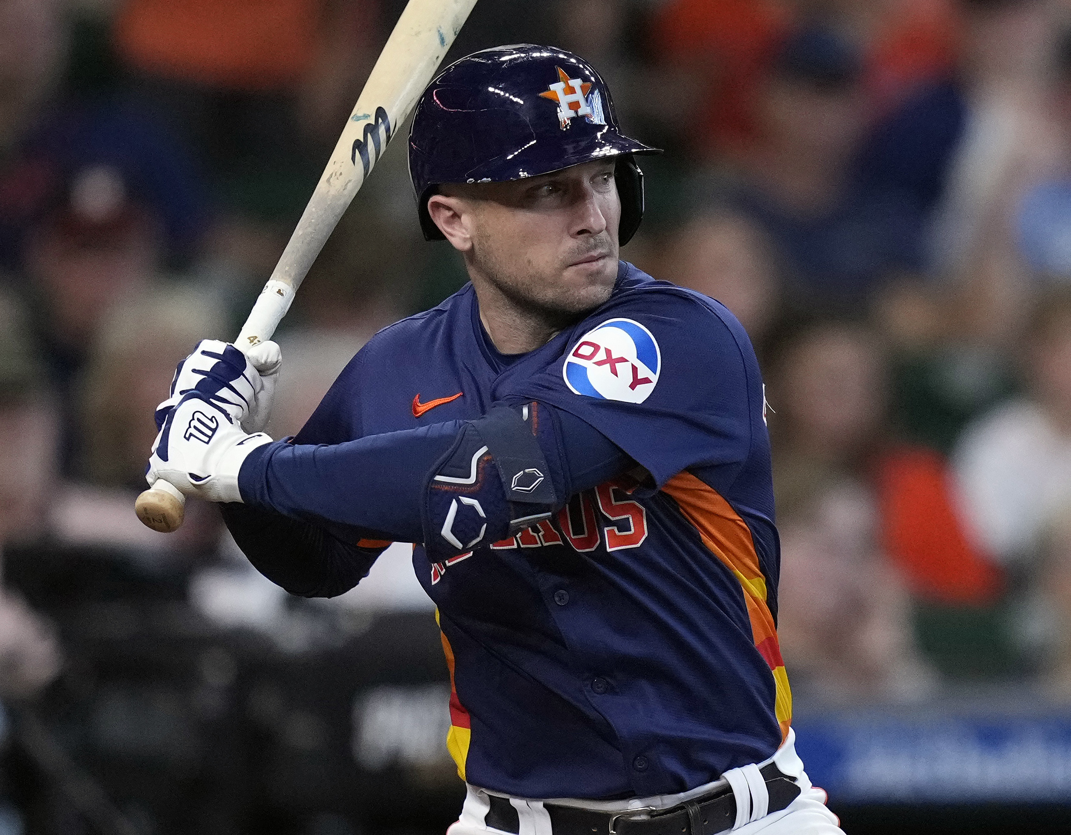 FILE - Houston Astros' Alex Bregman bats during the fifth inning of a baseball game against the Los Angeles Angels, Sept. 22, 2024, in Houston.