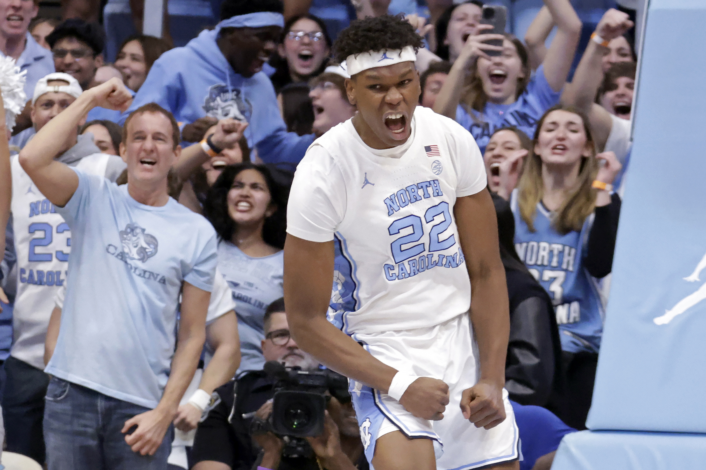 North Carolina forward Ven-Allen Lubin (22) celebrates after dunking in the final moments of the overtime period to seal the win in an NCAA college basketball game against Boston College, Saturday, Jan. 25, 2025, in Chapel Hill, N.C. 