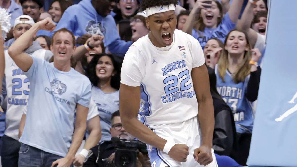 North Carolina forward Ven-Allen Lubin (22) celebrates after dunking in the final moments of the overtime period to seal the win in an NCAA college basketball game against Boston College, Saturday, Jan. 25, 2025, in Chapel Hill, N.C.