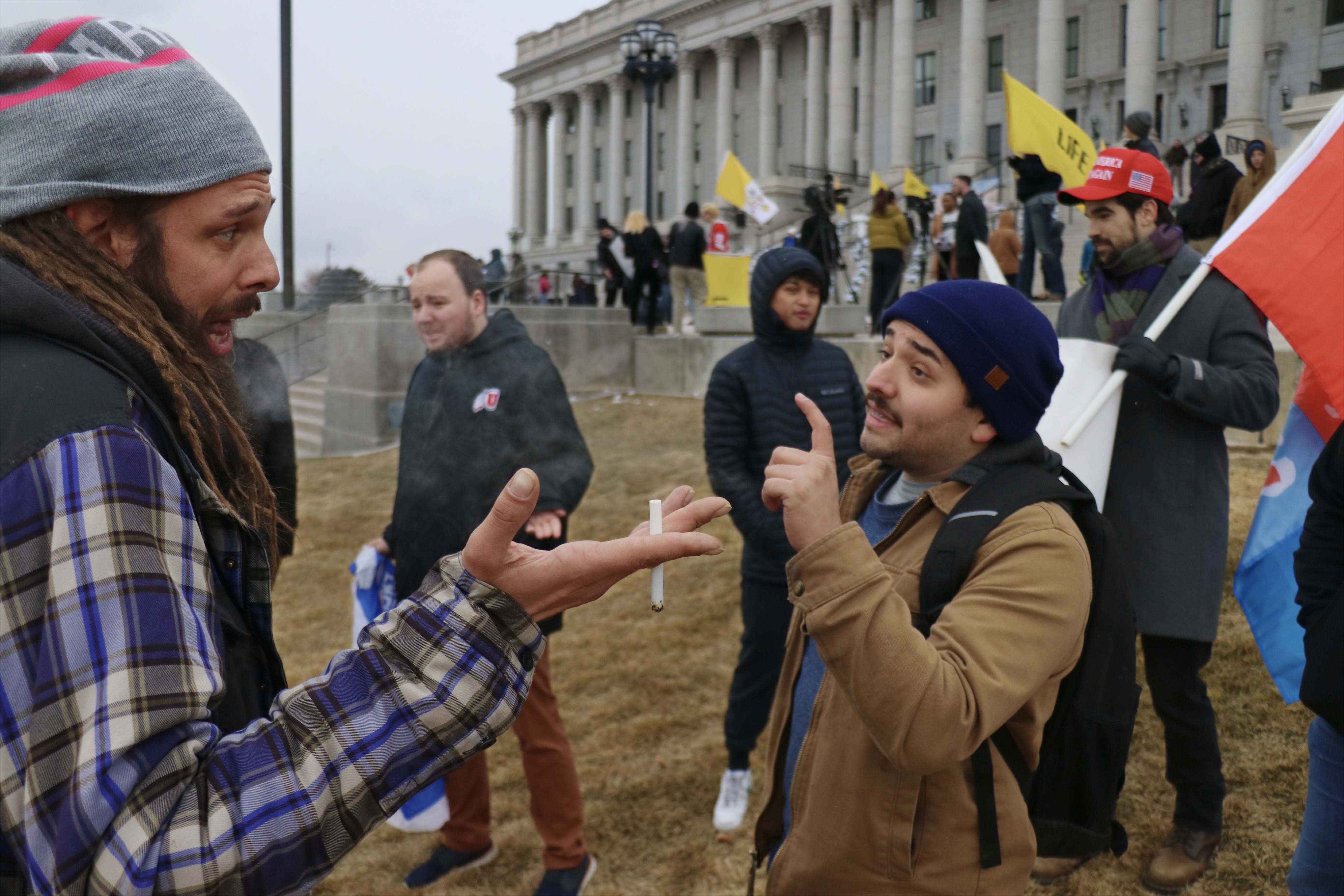 Cedric Cody, left, and Dave Sanchez, right, argue during the Utah March for Life 2025 at the Utah Capitol in Salt Lake City on Saturday.