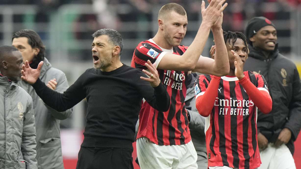 AC Milan's head coach Sergio Conceicao celebrates at the end of a Serie A soccer match between AC Milan and Parma, at the San Siro stadium in Milan, Italy, Sunday, Jan. 26, 2025.