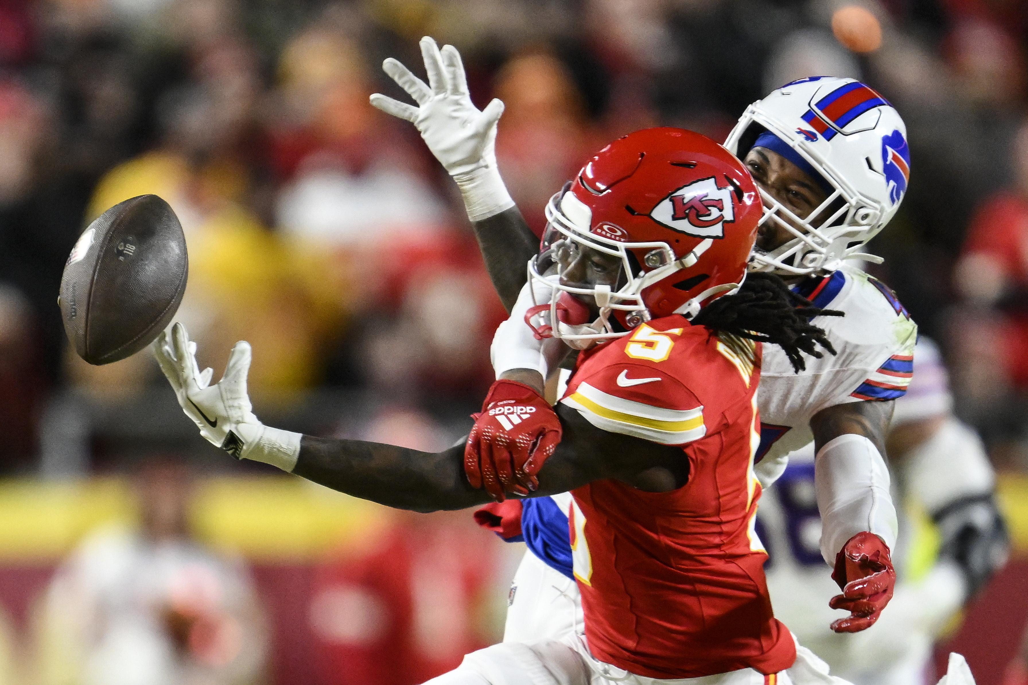 Kansas City Chiefs wide receiver Hollywood Brown (5) works for a catch against Buffalo Bills cornerback Christian Benford (47) during the first half of the AFC Championship NFL football game, Sunday, Jan. 26, 2025, in Kansas City, Mo. 