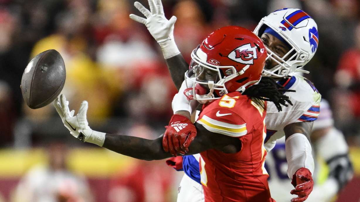 Kansas City Chiefs wide receiver Hollywood Brown (5) works for a catch against Buffalo Bills cornerback Christian Benford (47) during the first half of the AFC Championship NFL football game, Sunday, Jan. 26, 2025, in Kansas City, Mo.