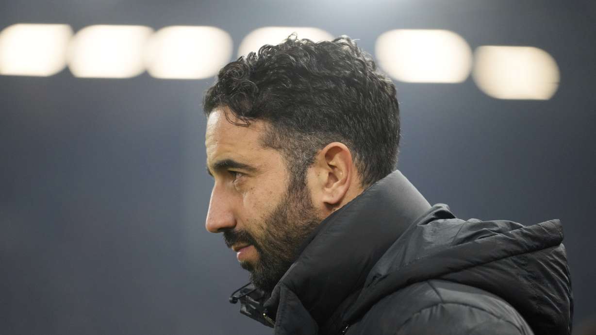 Manchester United's head coach Ruben Amorim arrives for the English Premier League soccer match between Fulham and Manchester United at Craven Cottage stadium in London, Sunday, Jan. 26, 2025.
