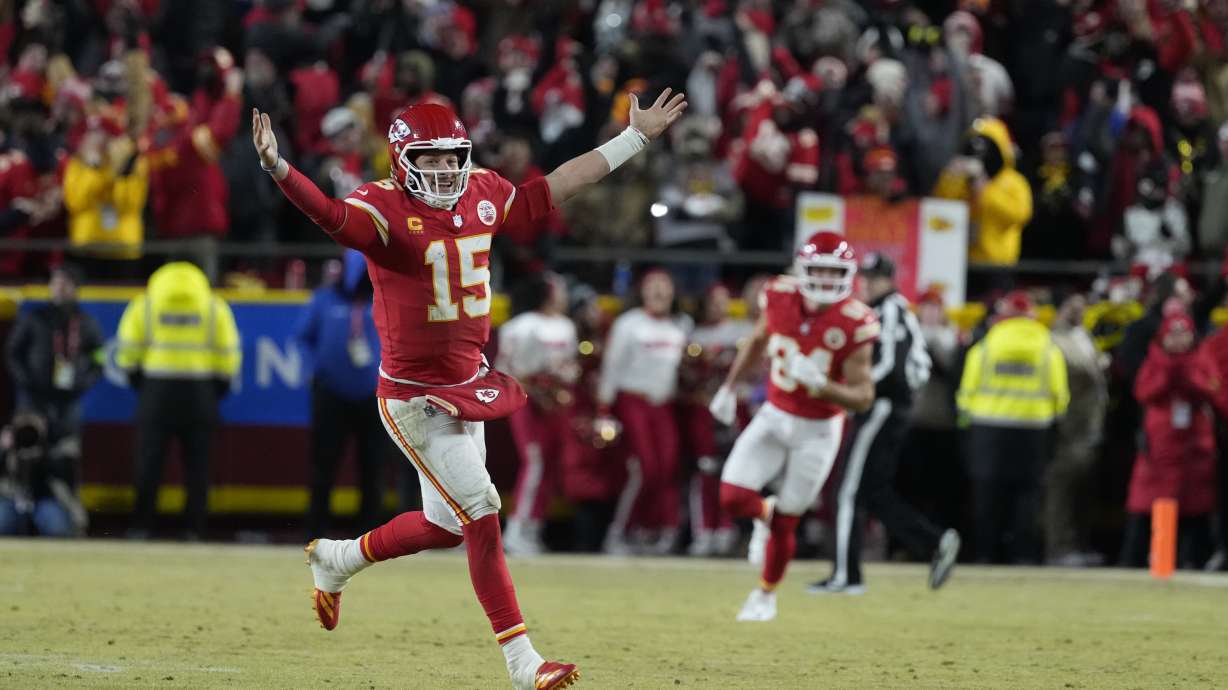 Kansas City Chiefs quarterback Patrick Mahomes (15) celebrates after defeating the Buffalo Bills in the AFC Championship NFL football game, Sunday, Jan. 26, 2025, in Kansas City, Mo.