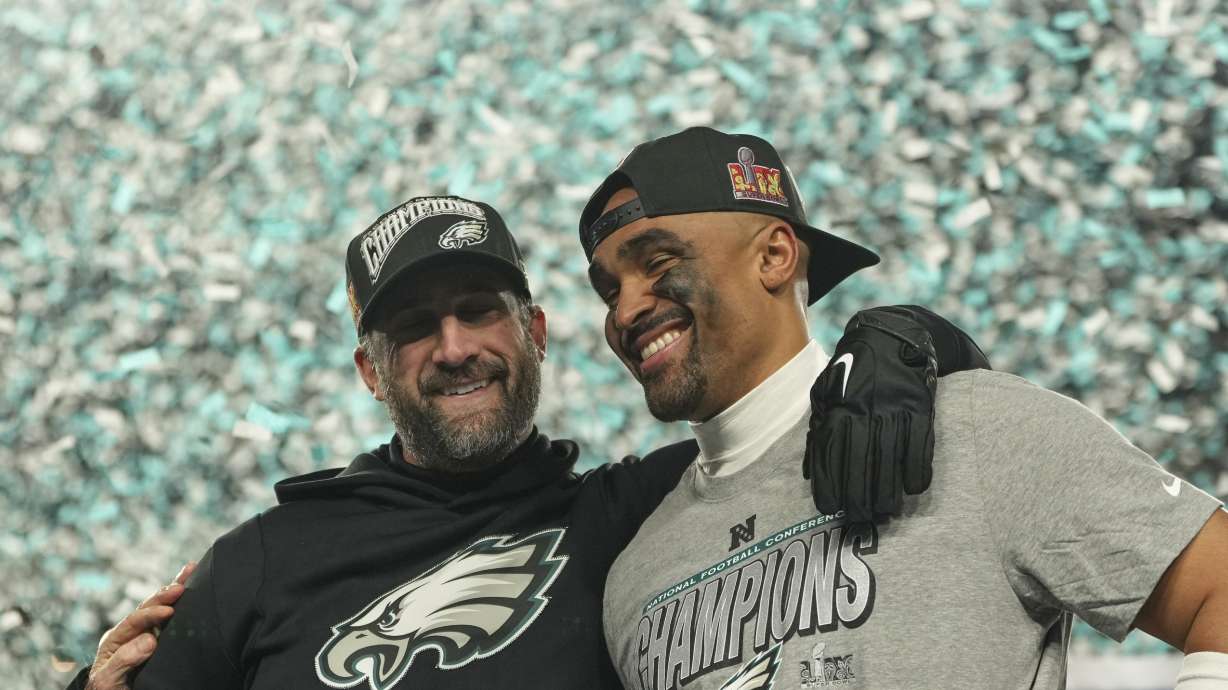 Philadelphia Eagles coach Nick Sirianni, left, quarterback Jalen Hurts celebrate after the Eagles won the NFC Championship NFL football game against the Washington Commanders, Sunday, Jan. 26, 2025, in Philadelphia.