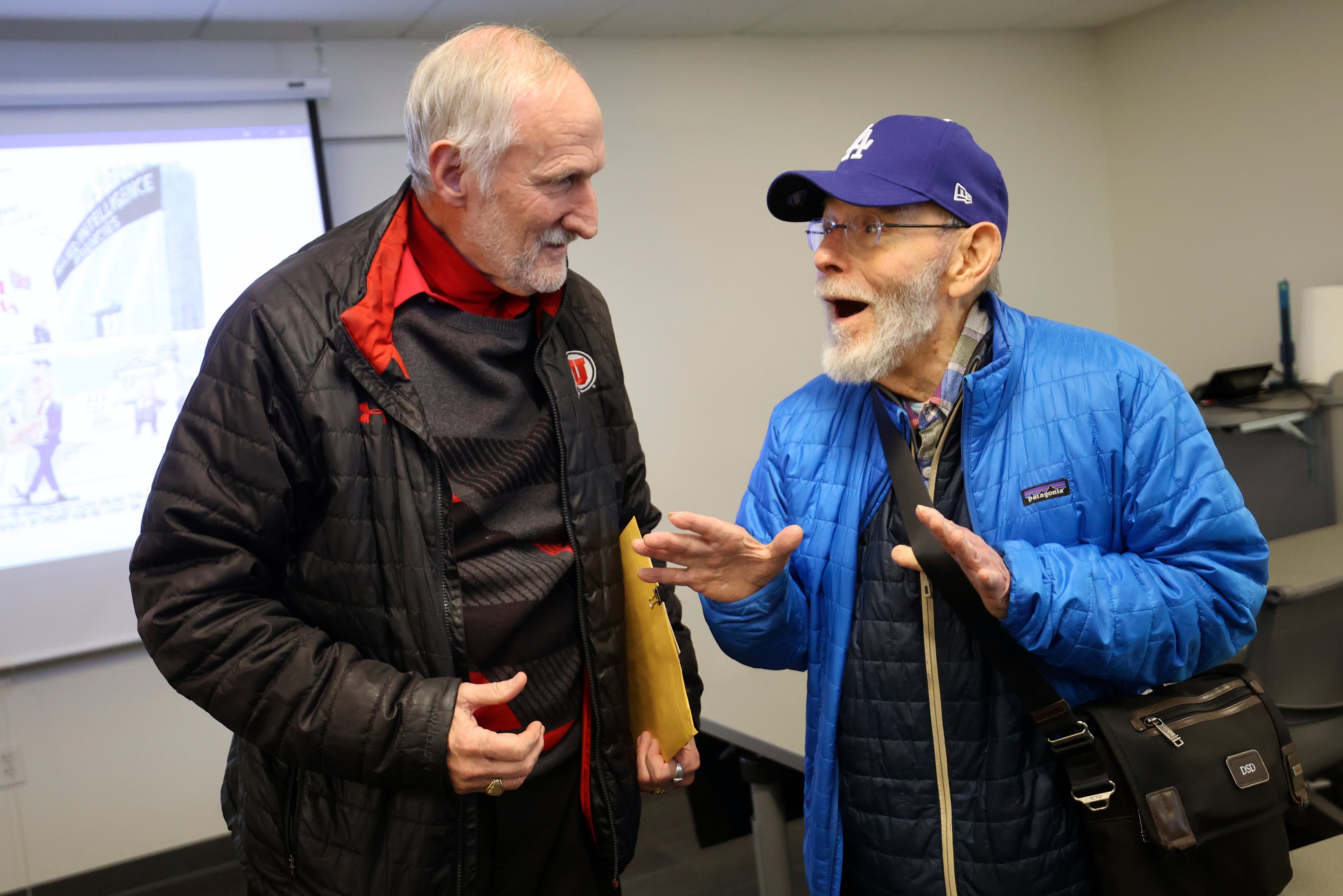 Tim Chambless talks with student Sandy Dolowitz after Chambless taught Current Issues in American Public Affairs and Politics at the Osher Lifelong Learning Institute at the University of Utah in Salt Lake City on Tuesday.