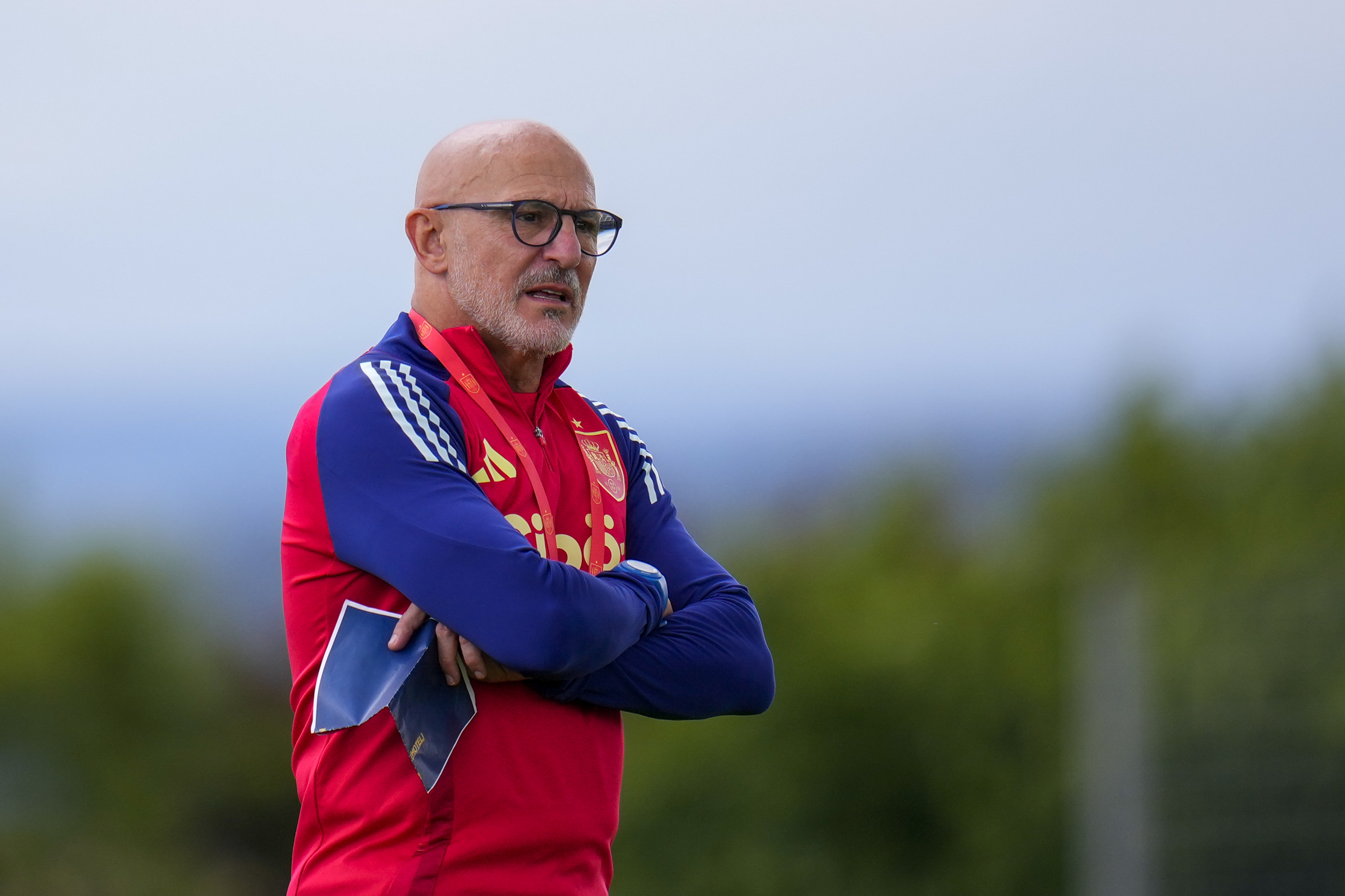 FILE - Spain's head coach Luis de la Fuente monitors a training session in Donaueschingen, Germany, July 6, 2024. 