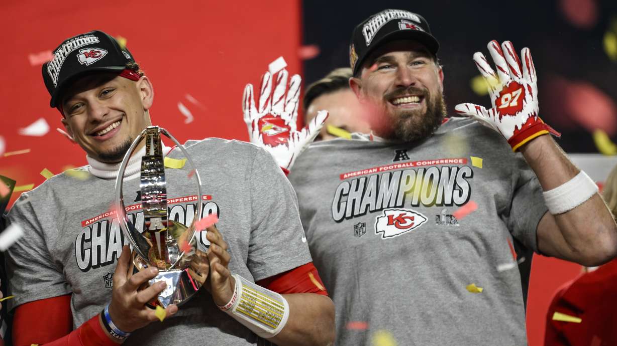 Kansas City Chiefs quarterback Patrick Mahomes and tight end Travis Kelce celebrate victory against the Buffalo Bills after the AFC Championship NFL football game, Sunday, Jan. 26, 2025, in Kansas City, Mo.