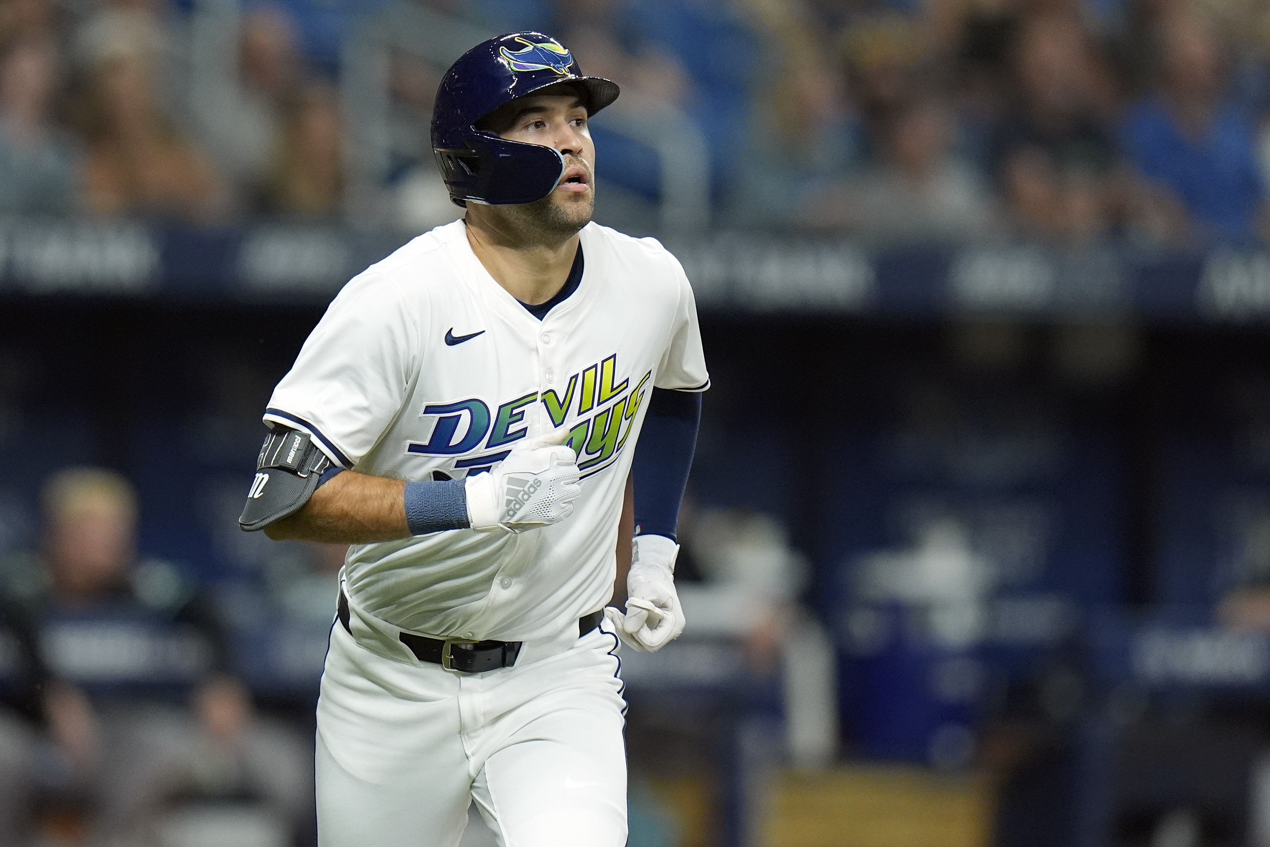 FILE - Tampa Bay Rays' Dylan Carlson watches his solo home run off Arizona Diamondbacks starting pitcher Ryne Nelson during the fifth inning of a baseball game, Aug. 16, 2024, in St. Petersburg, Fla. 