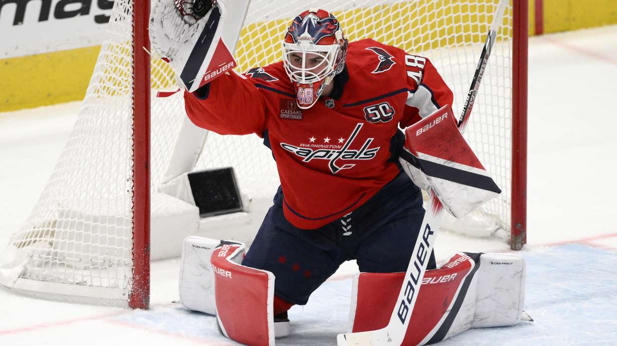 Washington Capitals goaltender Logan Thompson (48) catches the puck during the third period of an NHL hockey game against the Anaheim Ducks, Tuesday, Jan. 14, 2025, in Washington.