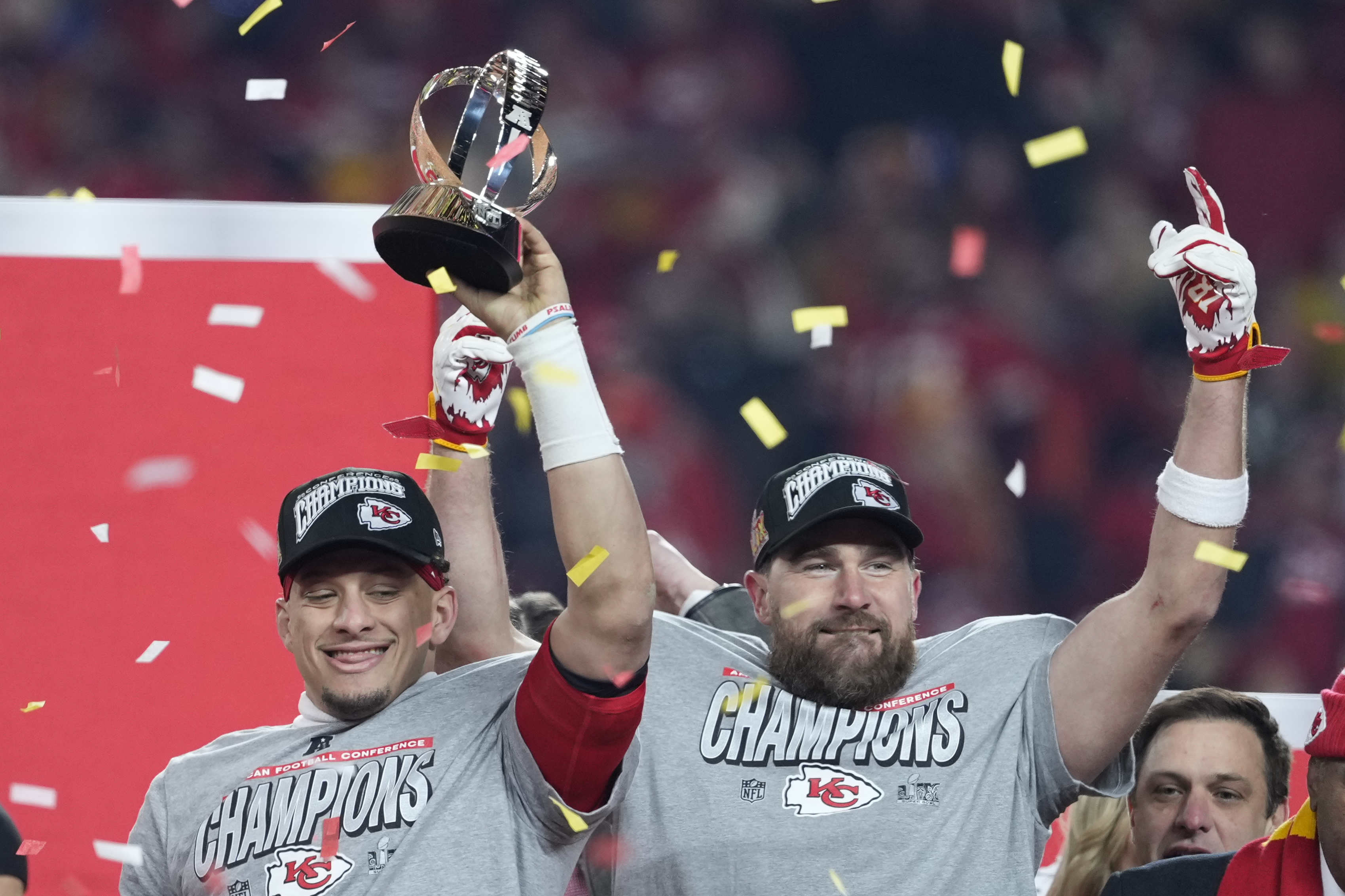 Kansas City Chiefs quarterback Patrick Mahomes, left, and tight end Travis Kelce celebrate after the Chiefs defeated the Buffalo Bills in the AFC Championship NFL football game, Sunday, Jan. 26, 2025, in Kansas City, Mo.