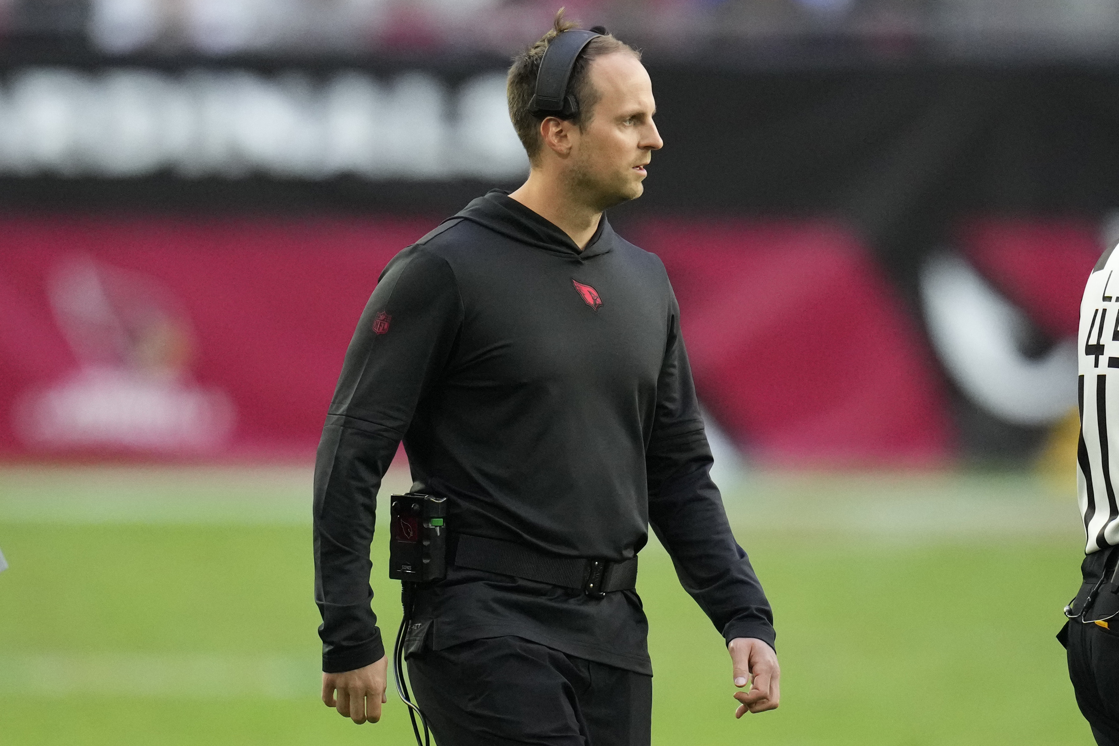 FILE - Arizona Cardinals linebackers coach Sam Siefkes pauses on the sideline during the first half of an NFL football game against the Los Angeles Rams, Nov. 26, 2023, in Glendale, Ariz. 