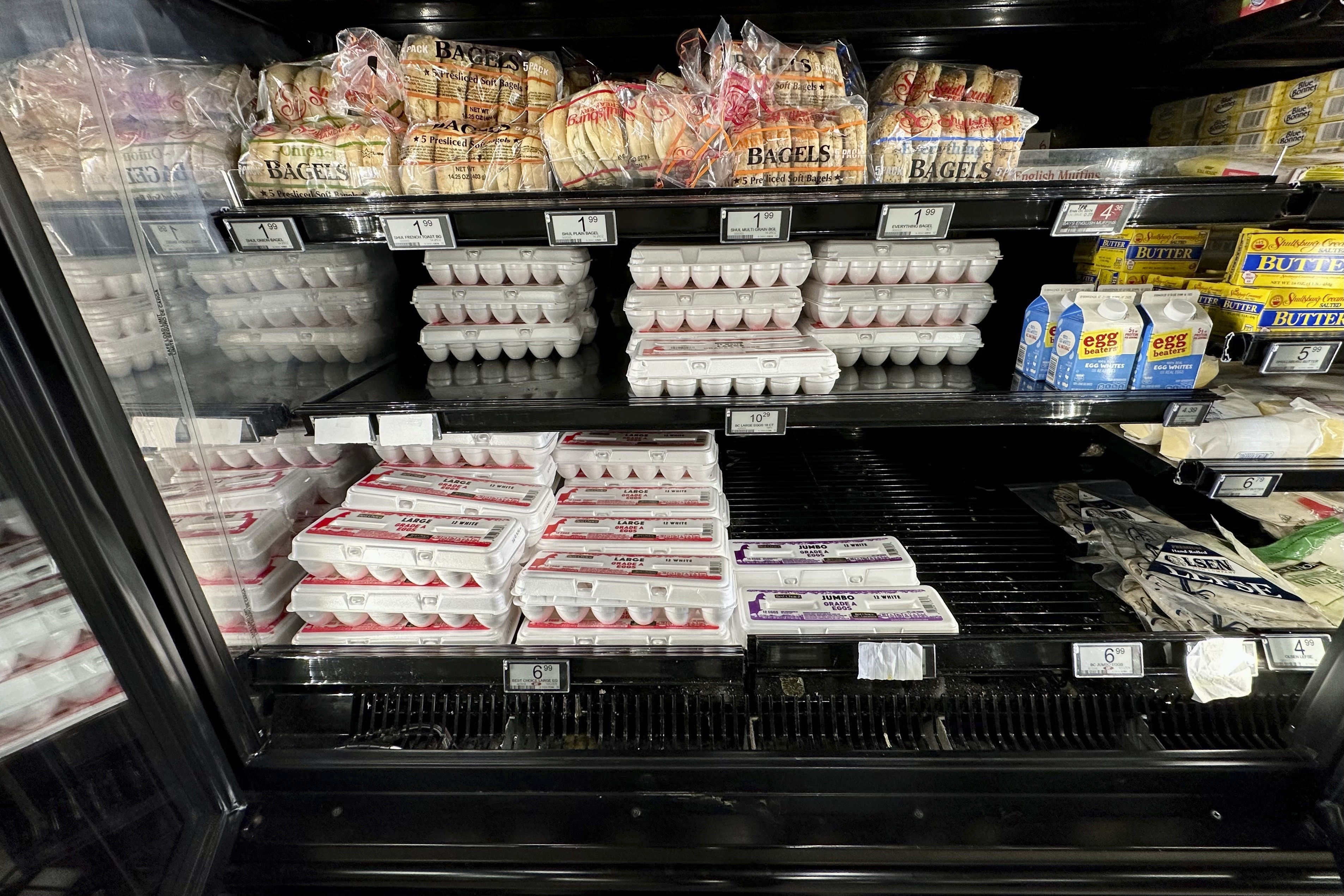 Eggs sit on a shelf at Sentyrz Liqour Supermarket, where staff say they've been receiving only 10 percent of their weekly orders, on Monday in Minneapolis, Minn. Egg prices are expected to stay higher for awhile.