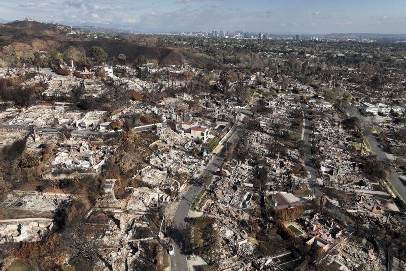 An aerial view shows the devastation left by the Palisades Fire in the Pacific Palisades section of Los Angeles, Monday.