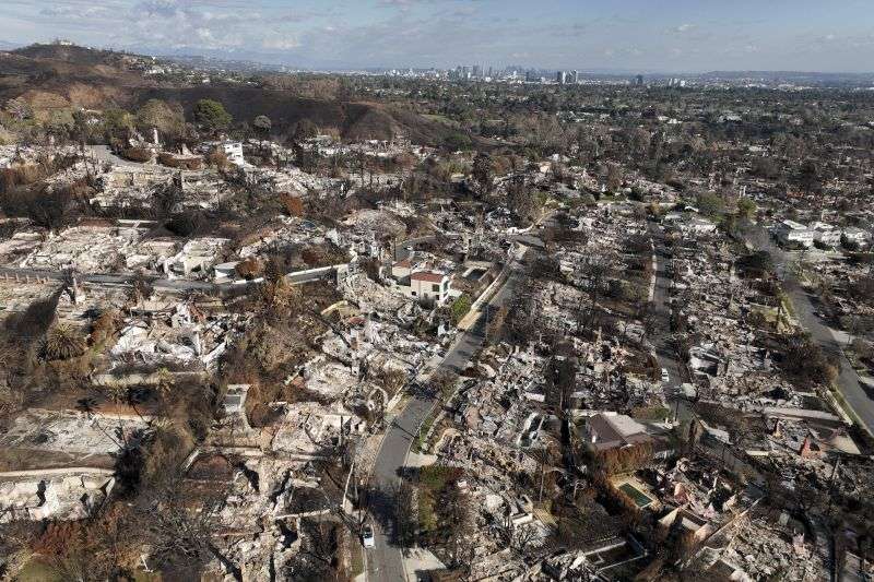 An aerial view shows the devastation left by the Palisades Fire in the Pacific Palisades section of Los Angeles, Monday.