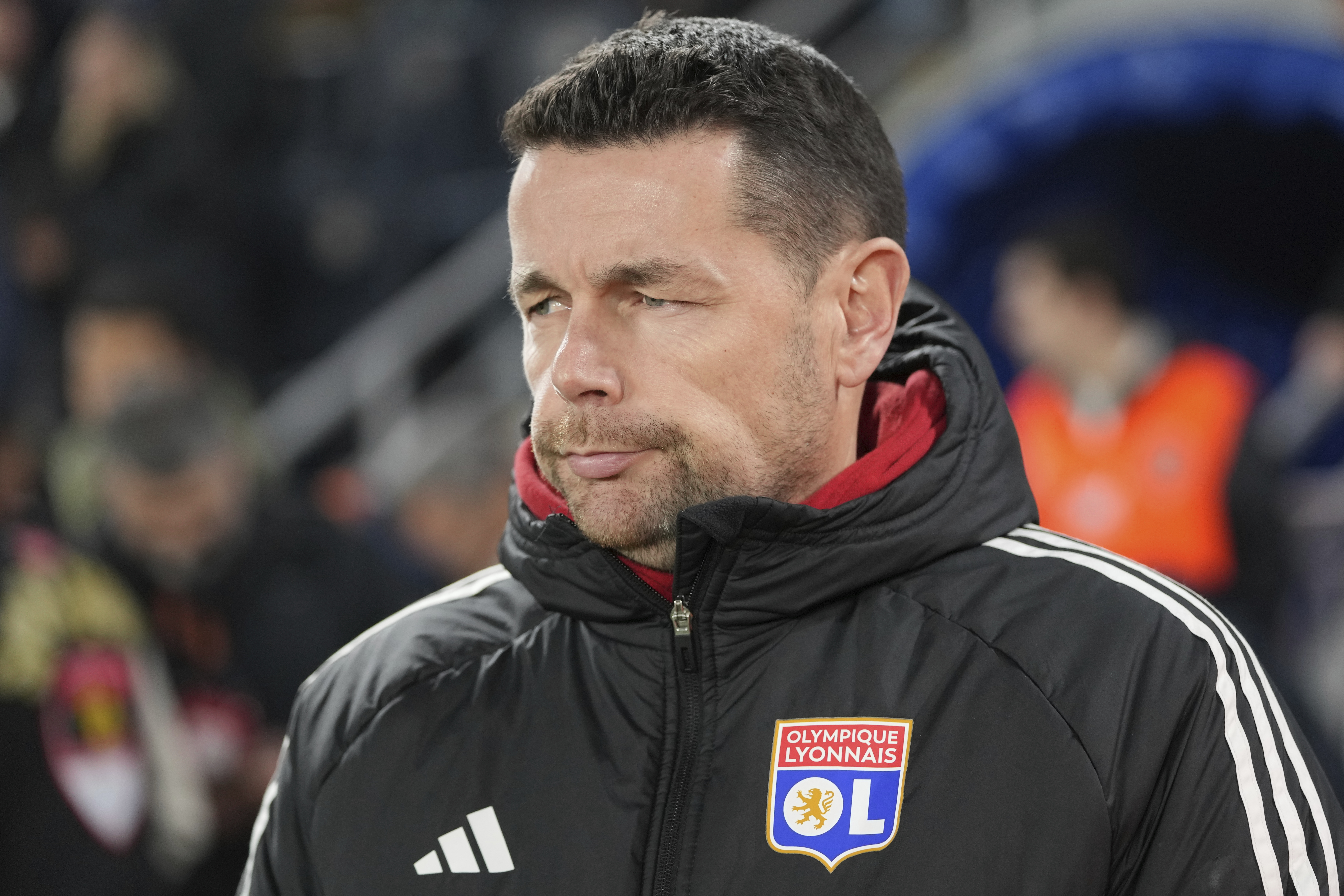 Lyon's head coach Pierre Sage waits for the beginning of he Europa League opening phase soccer match against Fenerbahce at Sukru Saracoglu stadium in Istanbul, Turkey, Thursday, Jan. 23, 2025. 