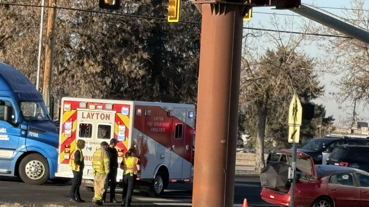 A man working as a crossing guard near Vae View Elementary School in Layton was hit by a car and killed Tuesday morning, according to police.